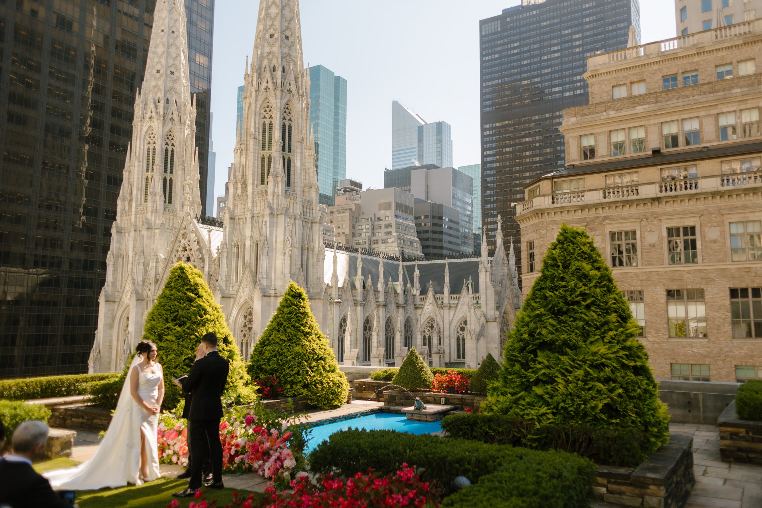 Rooftop wedding ceremony overlooking St. Patrick's Cathedral and Midtown Manhattan at one of the most iconic Wedding Locations in NYC.