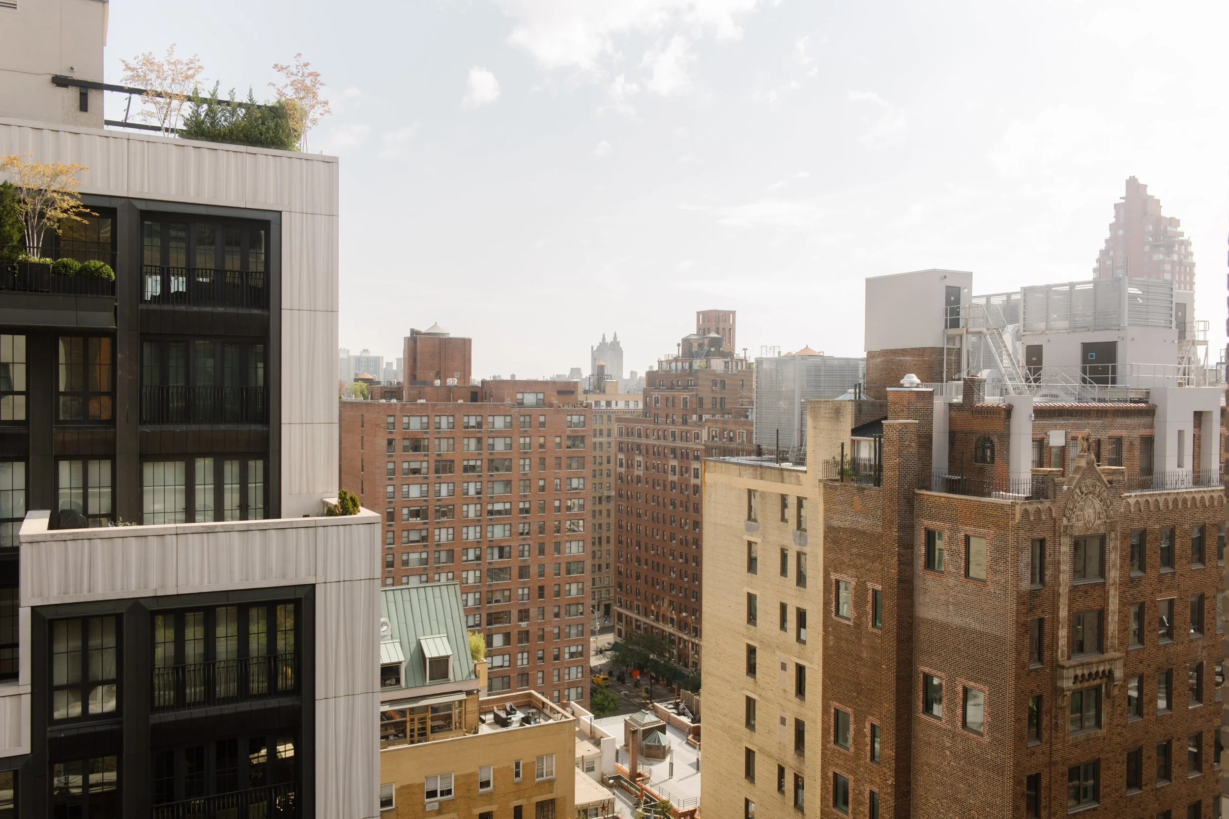 View of the Manhattan skyline from a hotel window before the wedding day begins.
