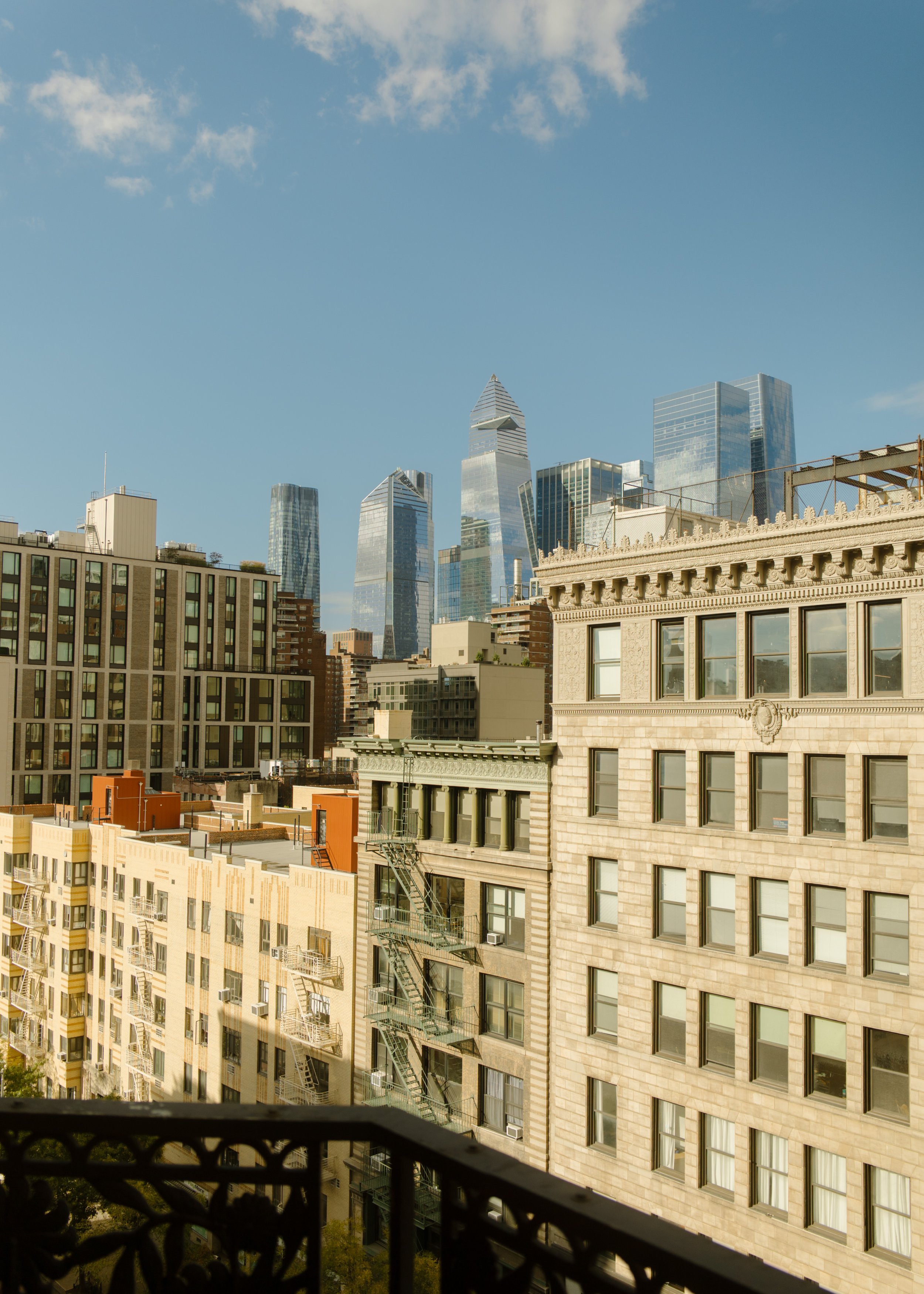 Skyline view from the balcony of one of the best NYC hotels for wedding morning photos and getting ready.