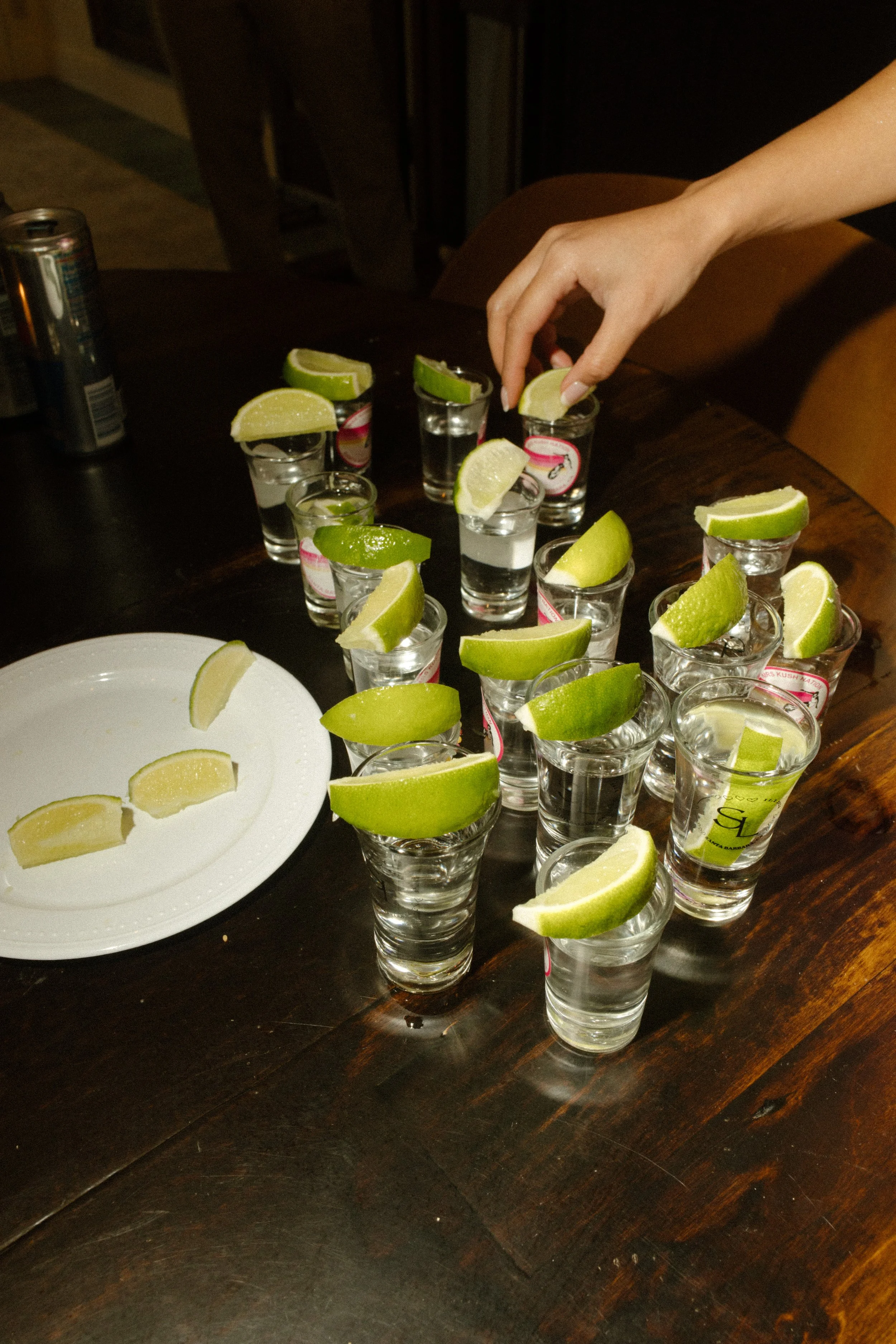 Lime-topped drinks lined up on a table for guests during a fun wedding weekend celebration