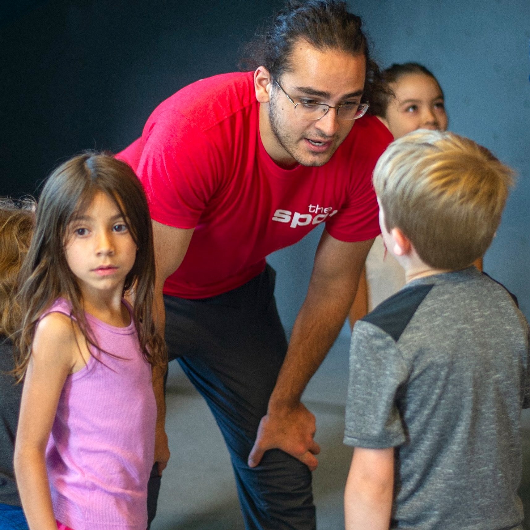 Coach working with Youth Climbers at The Spot Louisville.jpg