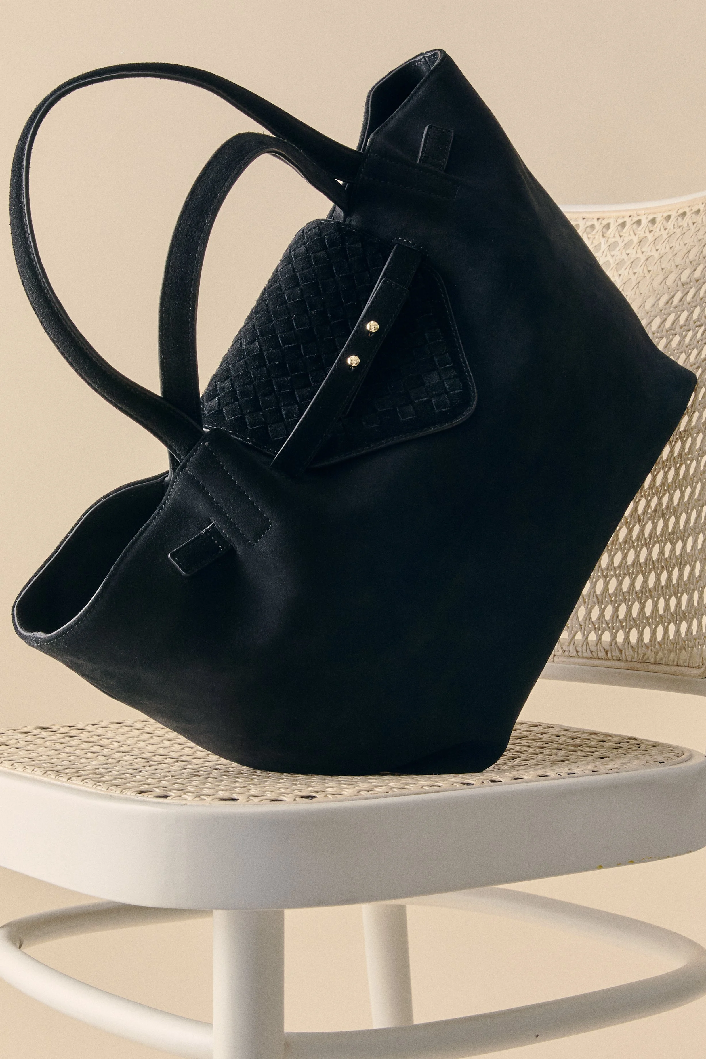 B3_12.18.25_000273_Bag on Chair.jpg