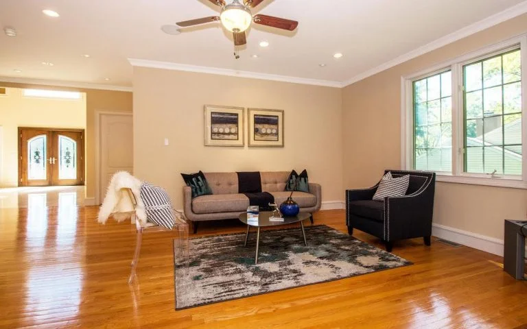 After: Lovely family room with stylish and on trend furniture.