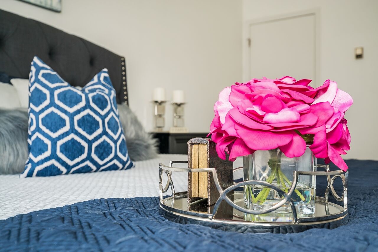 spaces-that-speak-home-stagers-fortlee-nj-bedroom-flowers.jpg