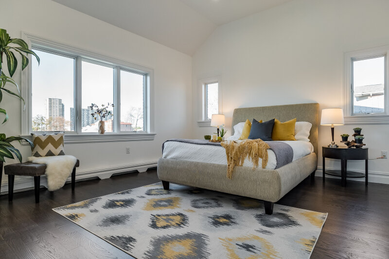 fort lee master bedroom staging spaces that speak yellow grey palette.jpg