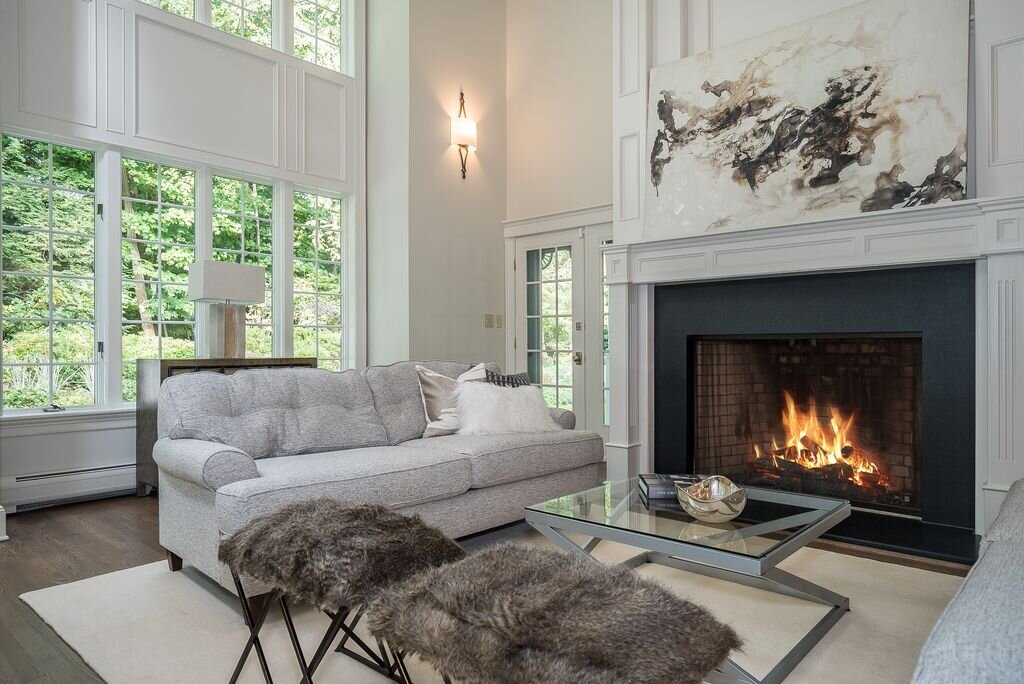 spaces that speak home staging mahwah nj great room fireplace oversized art grey brown beige staging.jpg