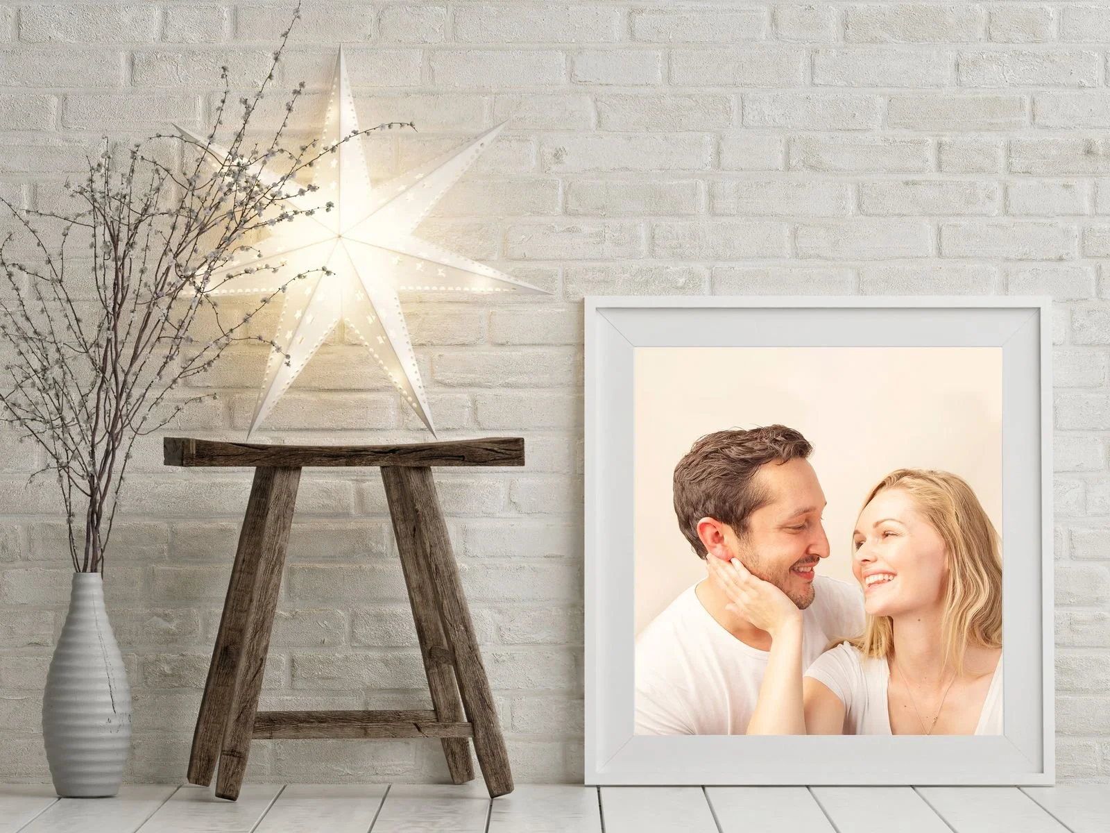 A couples portrait displayed as wall art in a home