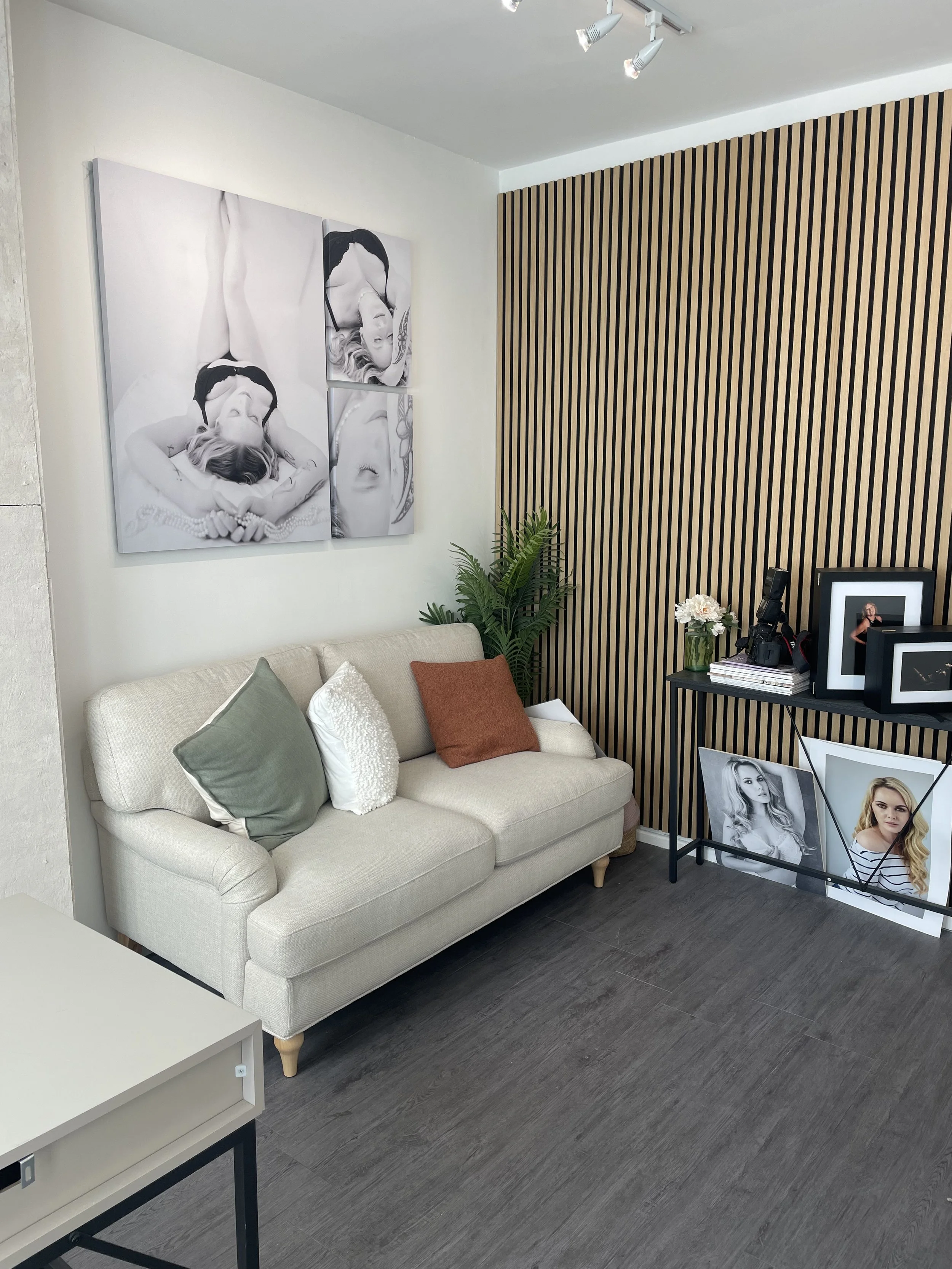 "Studio welcome area at Bath Boutique Studio — comfortable seating, warm tones, and a calm atmosphere on arrival"