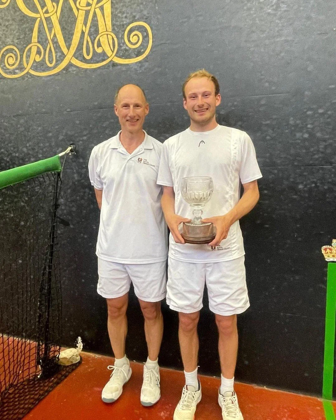 A proud day on the Royal Tennis Court! 🏆

Charlie Elmitt defeated his father, Richard Elmitt, 6&ndash;3, 6&ndash;2 to become the new Royal Tennis Court Club Champion and lift the prestigious Barker Camm Cup.

To top it off, Charlie also achieved his