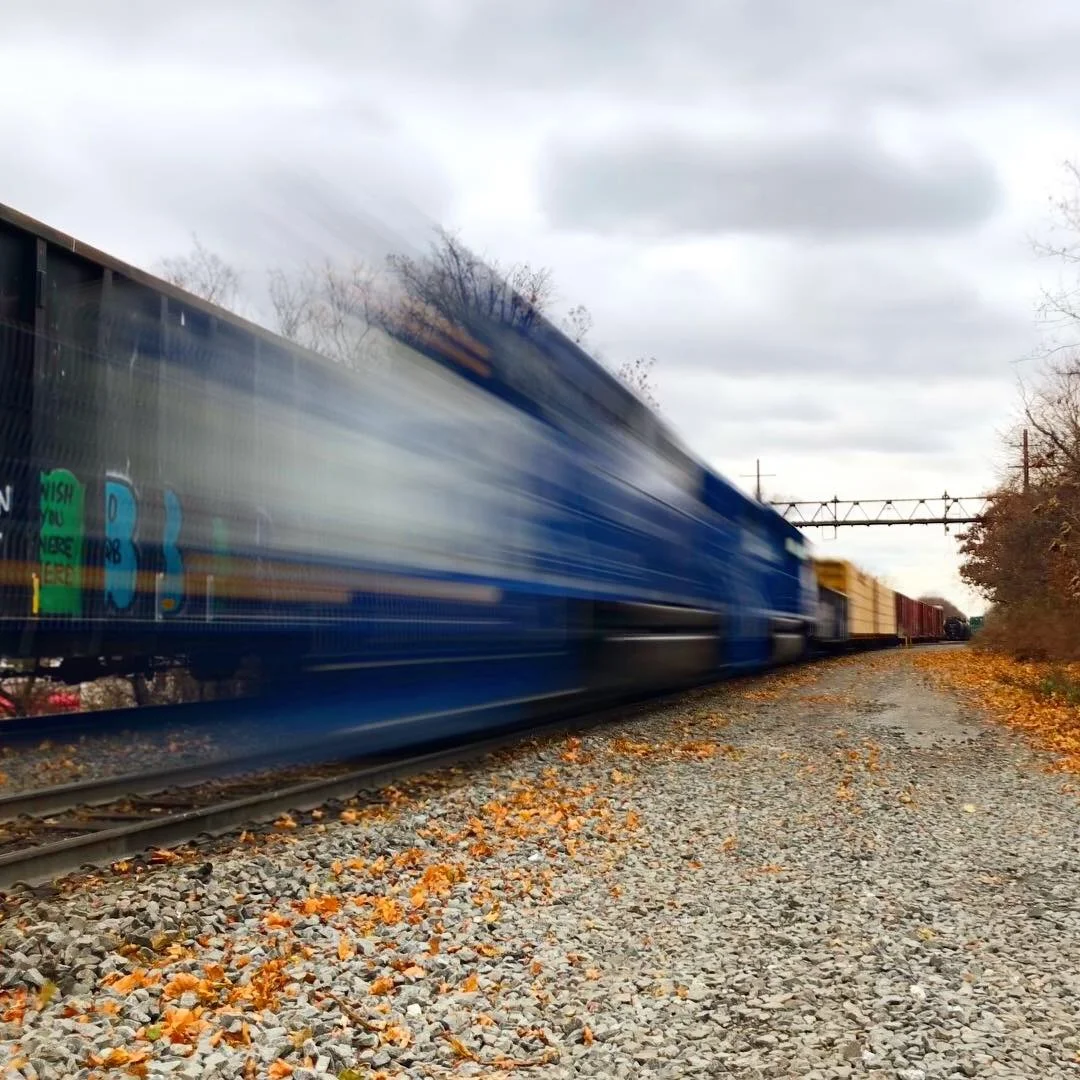 A locomotive rolls by on the New York and Atlantic tracks in Queens.