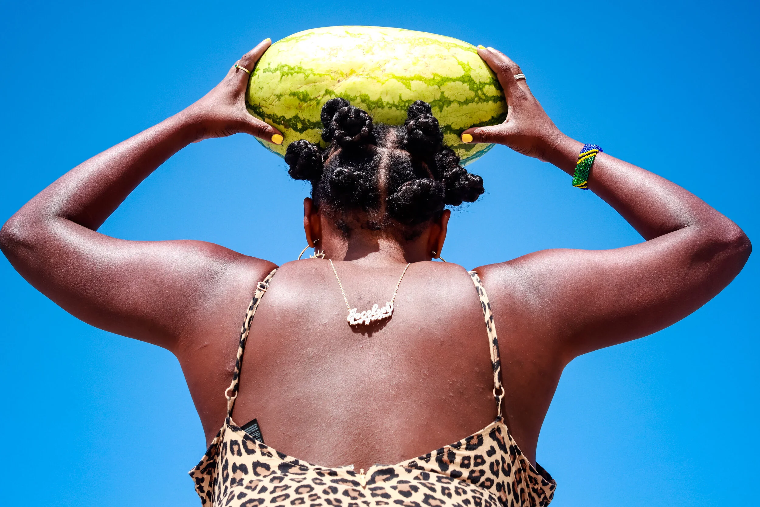 back to camera watermelon on head.jpg