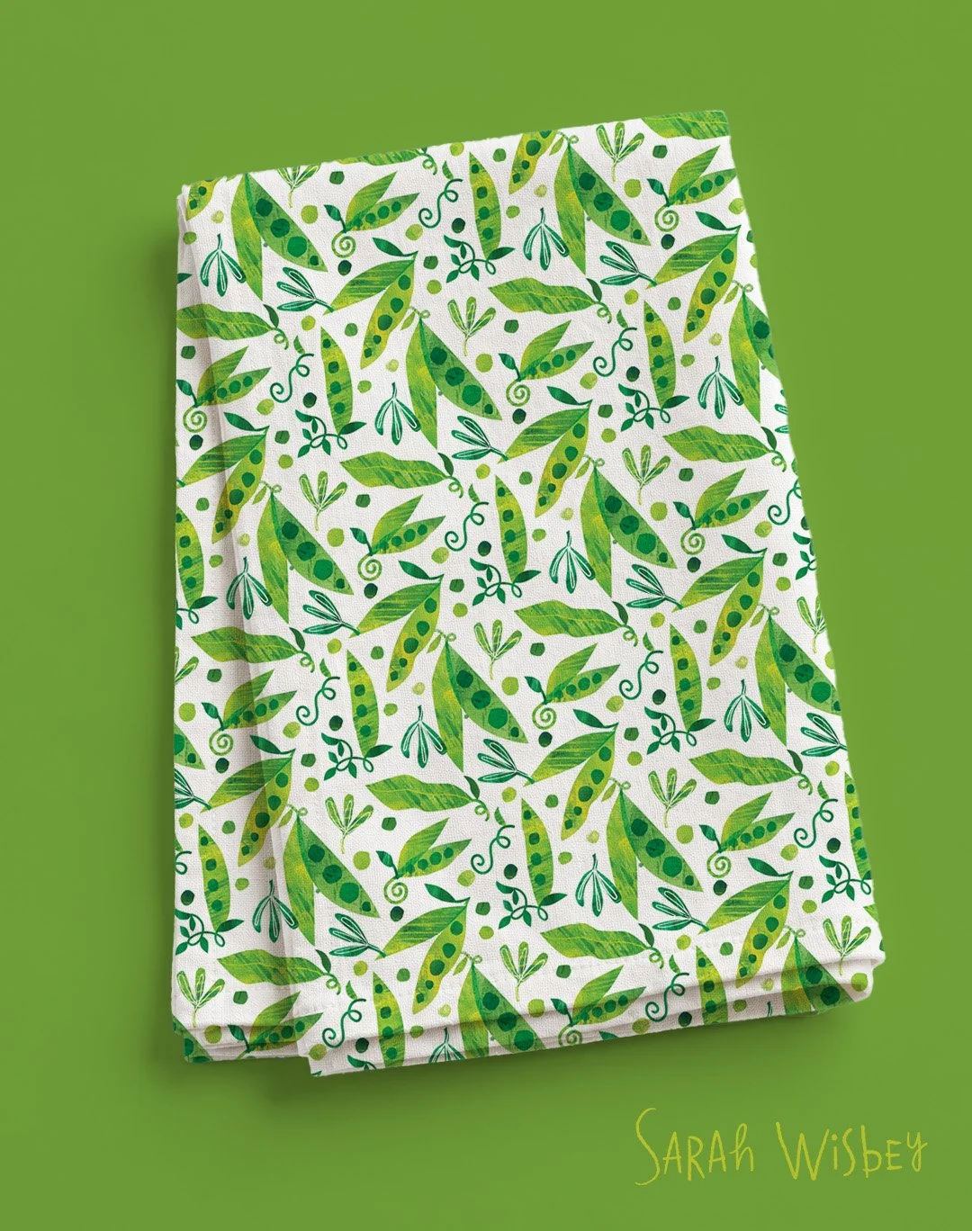 repeat pattern of peas on a tea towel