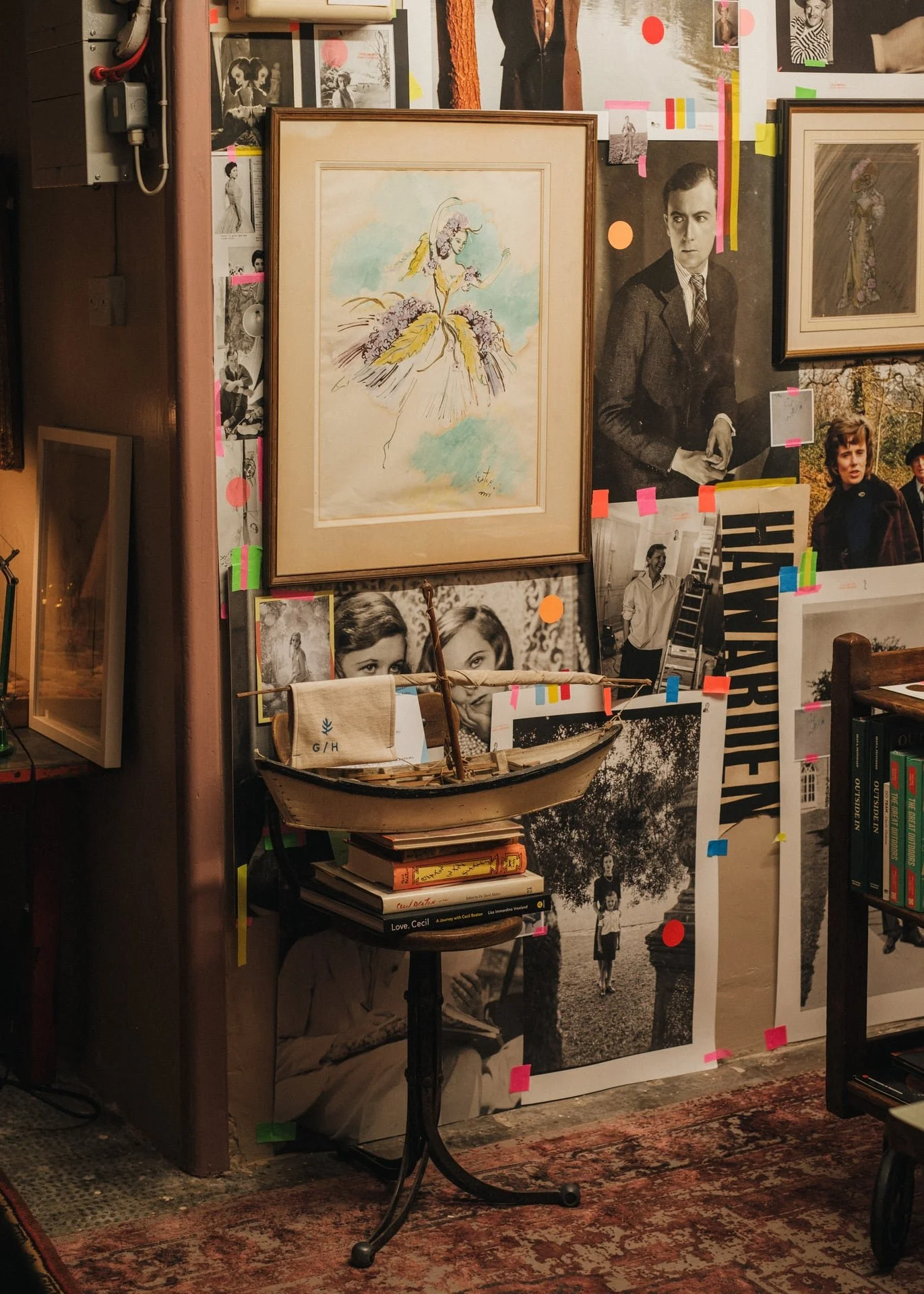 Cecil Beaton's sit against a wall - a striking collage of illustrations and photographs