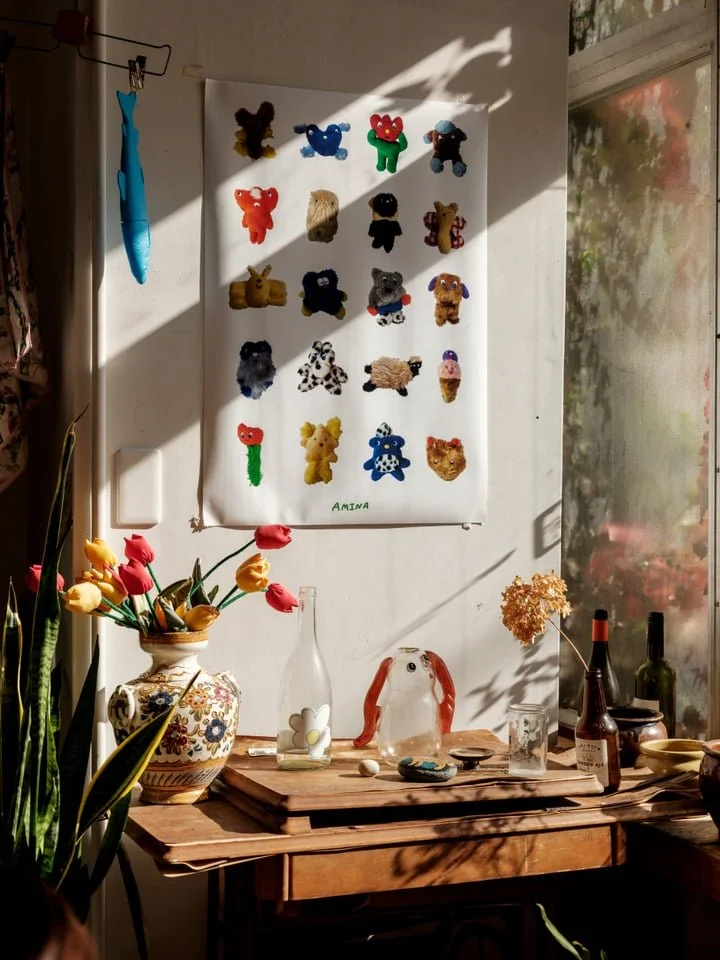 Antique and handcrafted objects catch the sun in the cafe of HOUSEHOLD in Himi Japan