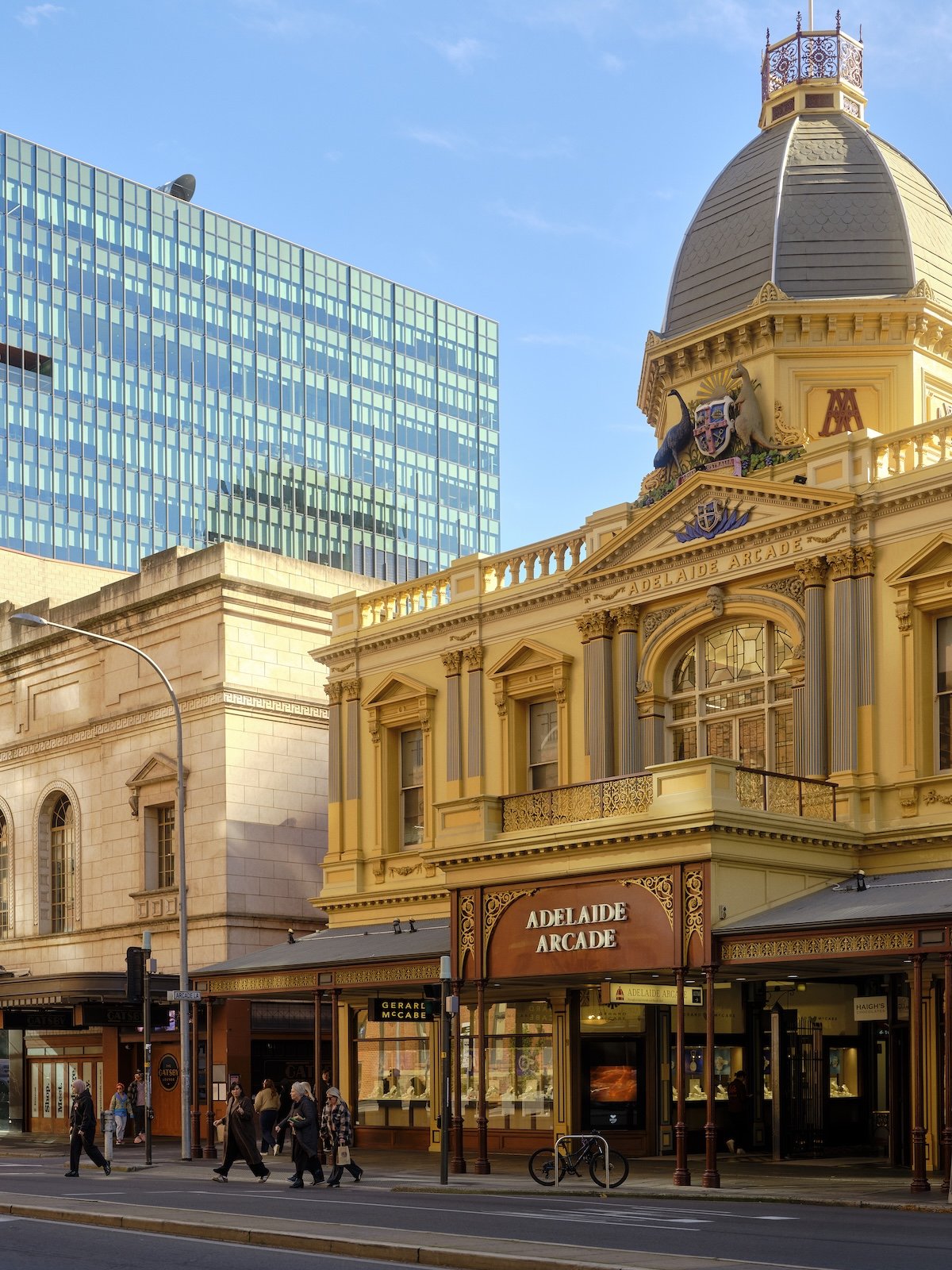 A federation-era shopping facade sits amongst modern architecture in central Adelaide