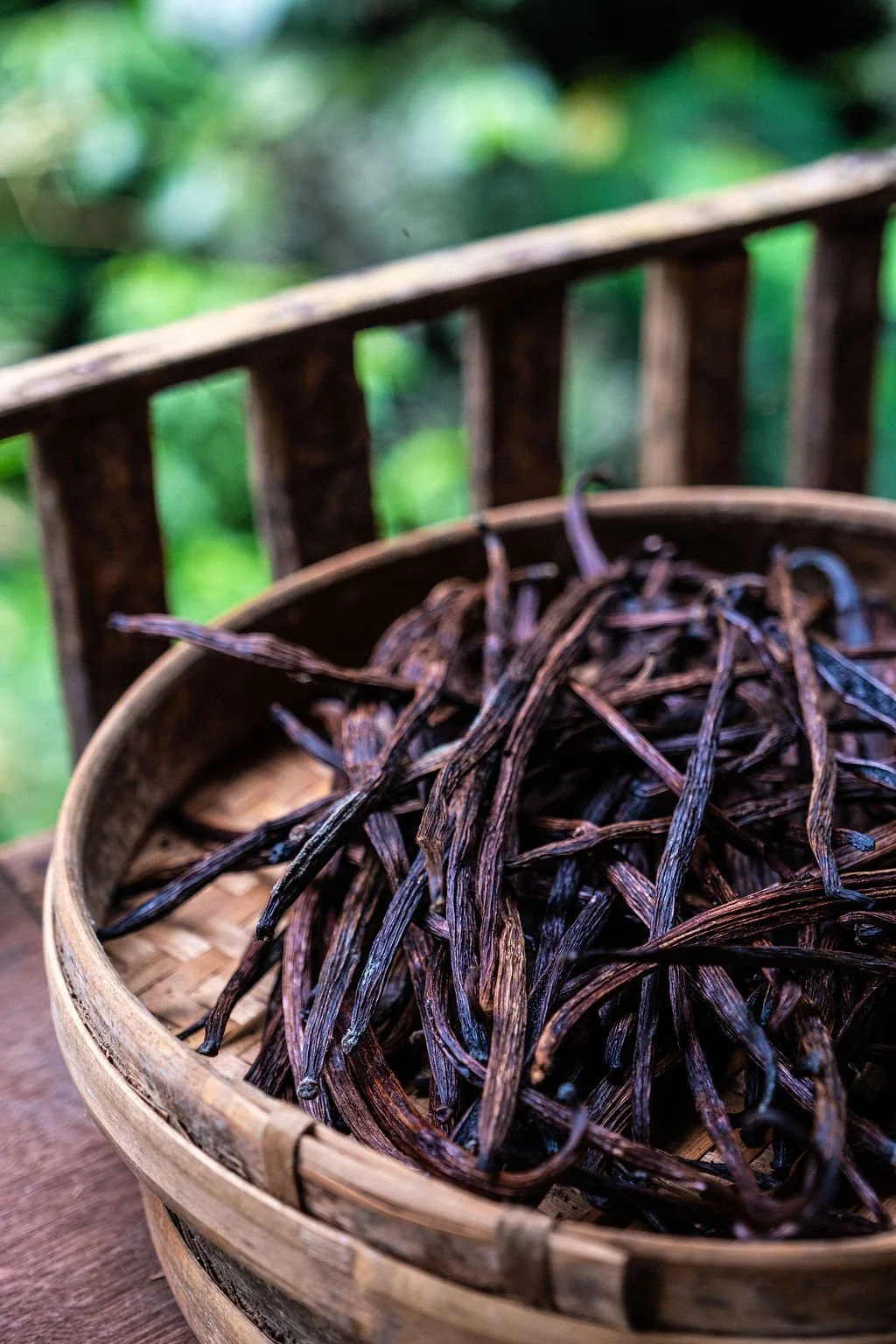 Sticks of vanilla in a bowl on a balcony in Ubud Bali