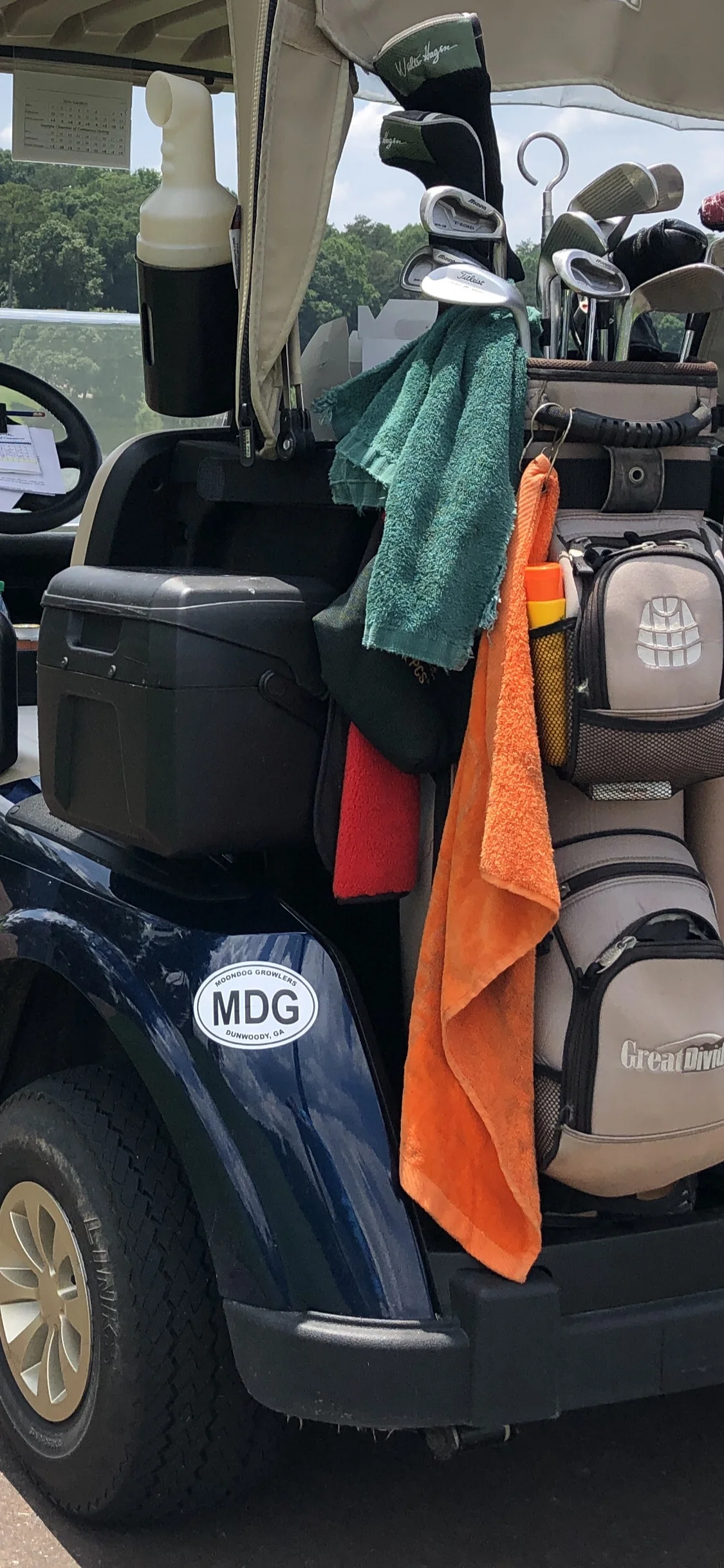 MDG logo on a golf cart at a local country club
