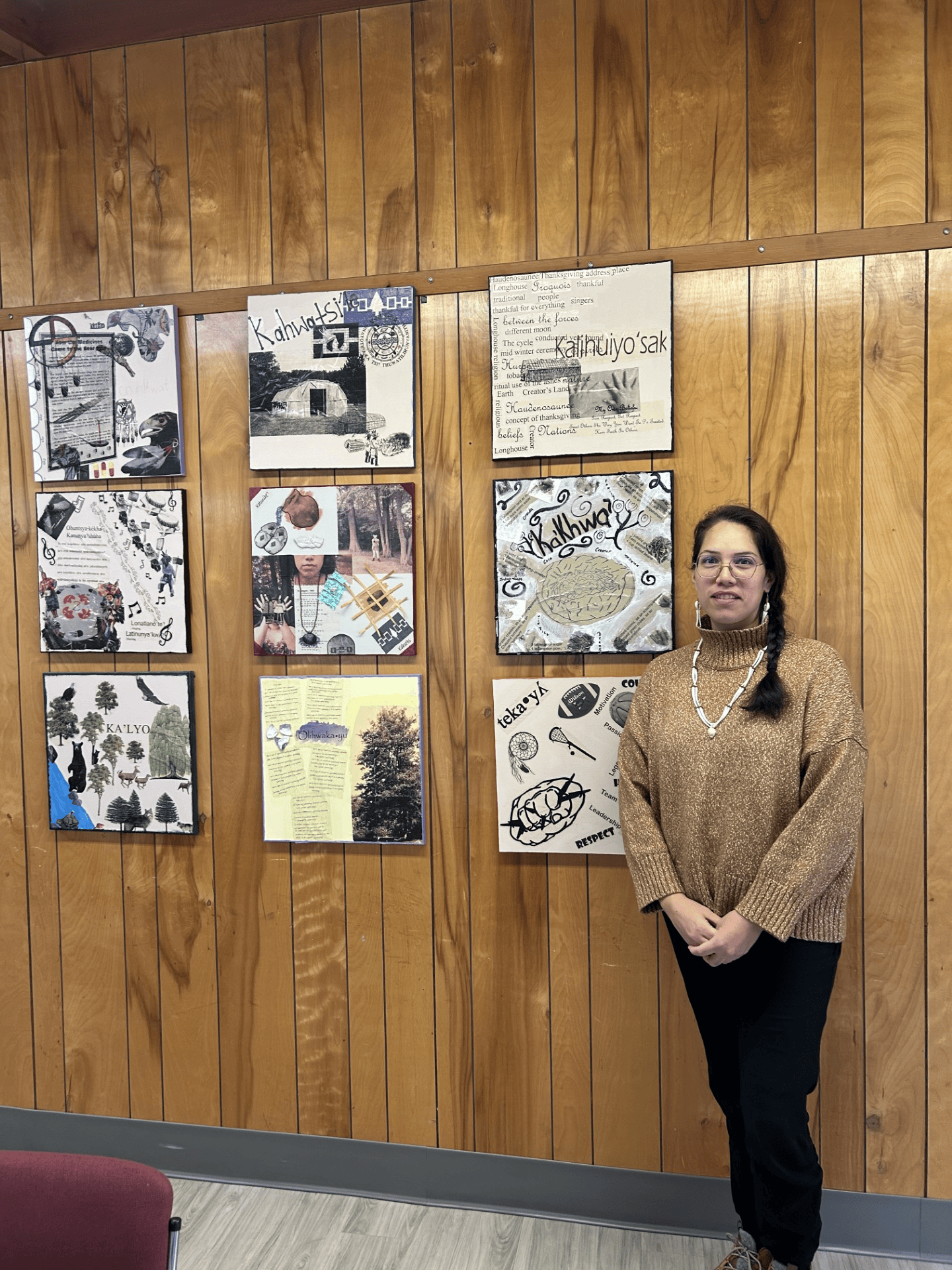 Gabbie with student art.png