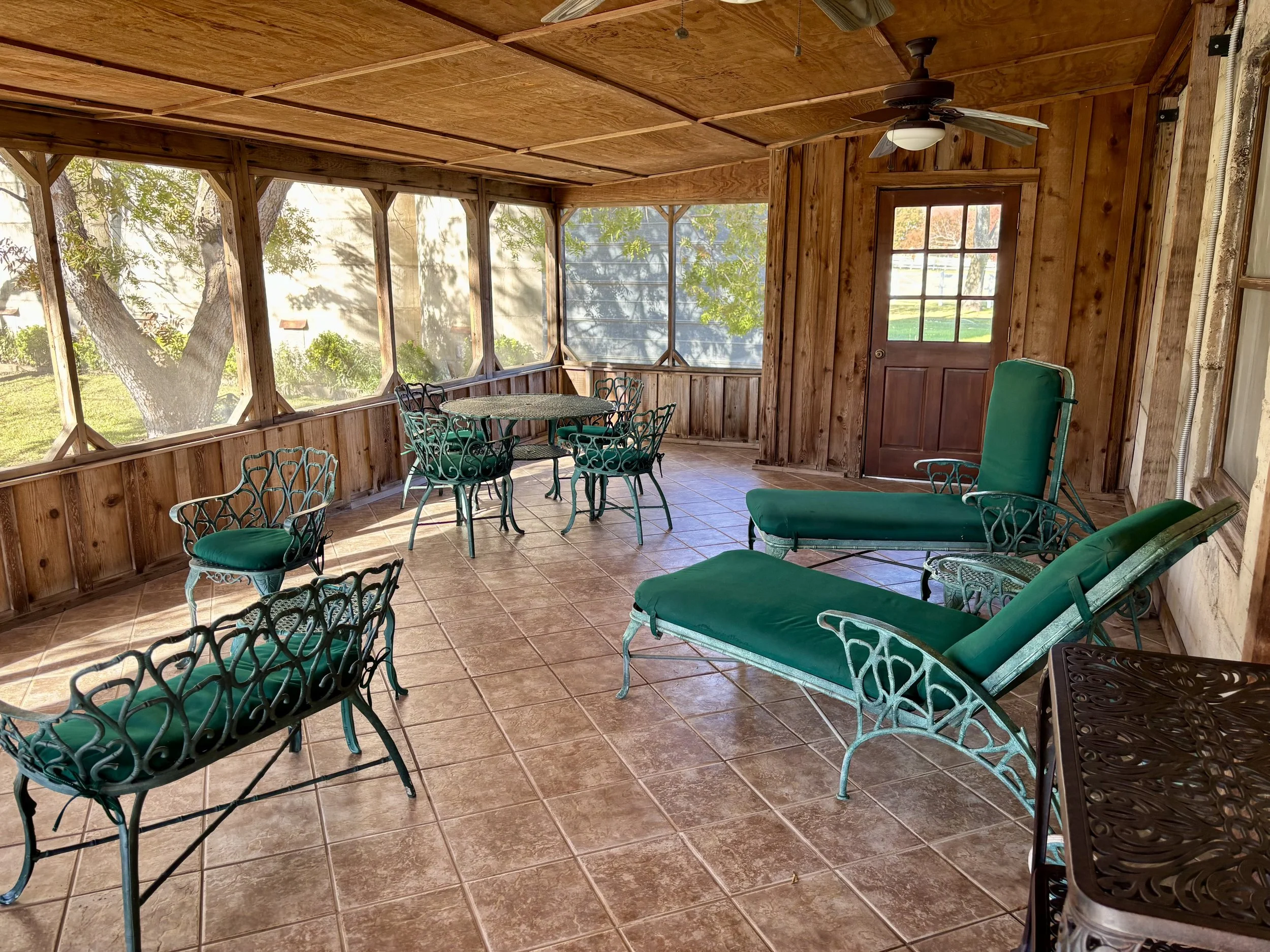 MH screened porch.jpeg