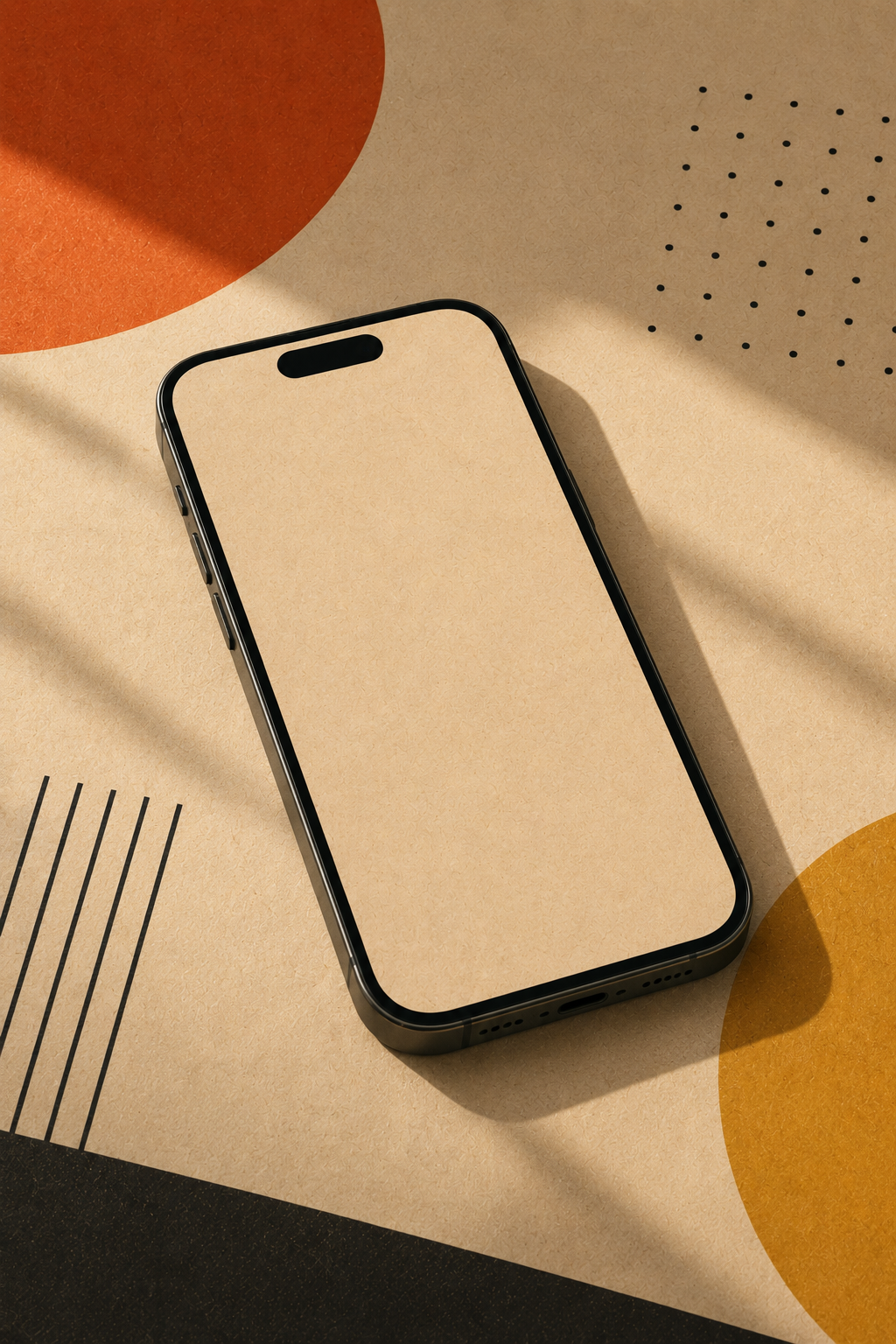 A smartphone with a blank screen placed on a geometric, patterned paper background with orange, beige, and black colors.