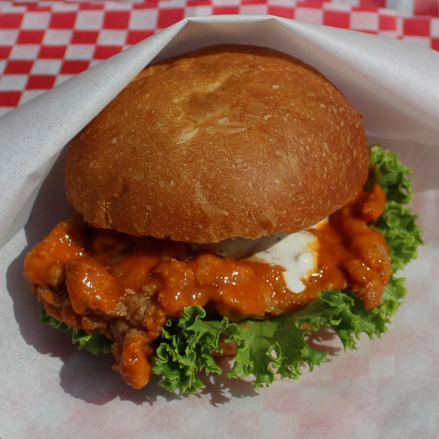 The weather is getting warm and this buffalo chicken sandwich is hot!  Free delivery when you order through the link in bio.  Use promo code WARMING.UP. Offer ends 2/25