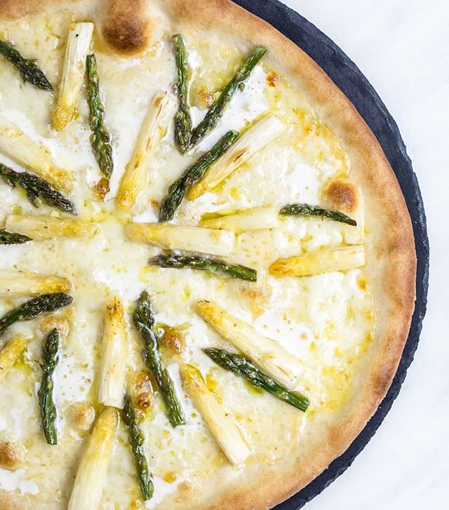 Happy Valentine's Day! We're celebrating with this asparagus (green and white), Port Salut, real truffle oil, and lemon zest pizza. Luxurious, delicious, and with no onion or garlic to cause bad breath! One of the keys is using real truffle oil,  which is harder to find than you might expect.
.
#valentinesdaypizza #valentinesdaydinner #romanticdinner #asparagus #asparaguspizza #whiteasparagus #fancypizza #truffleoil #trufflepizza #pizzaoftheday #pizzaoftheweek #pizzanight #pizzatime #portsalut