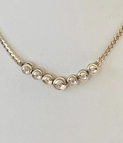 POPULAR STYLE CHEVRON DIAMOND PENDANT ON CHAIN 9CT GOLD WITH VALUATION