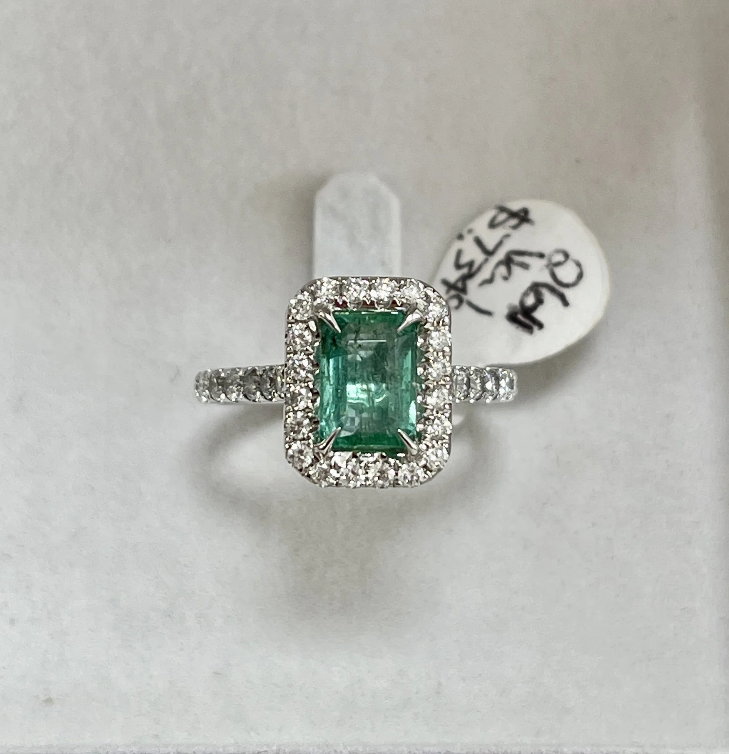 ZAMBIAN EMERALD AND DIAMOND HALO RING WITH VALUATION 18CT WHITE GOLD