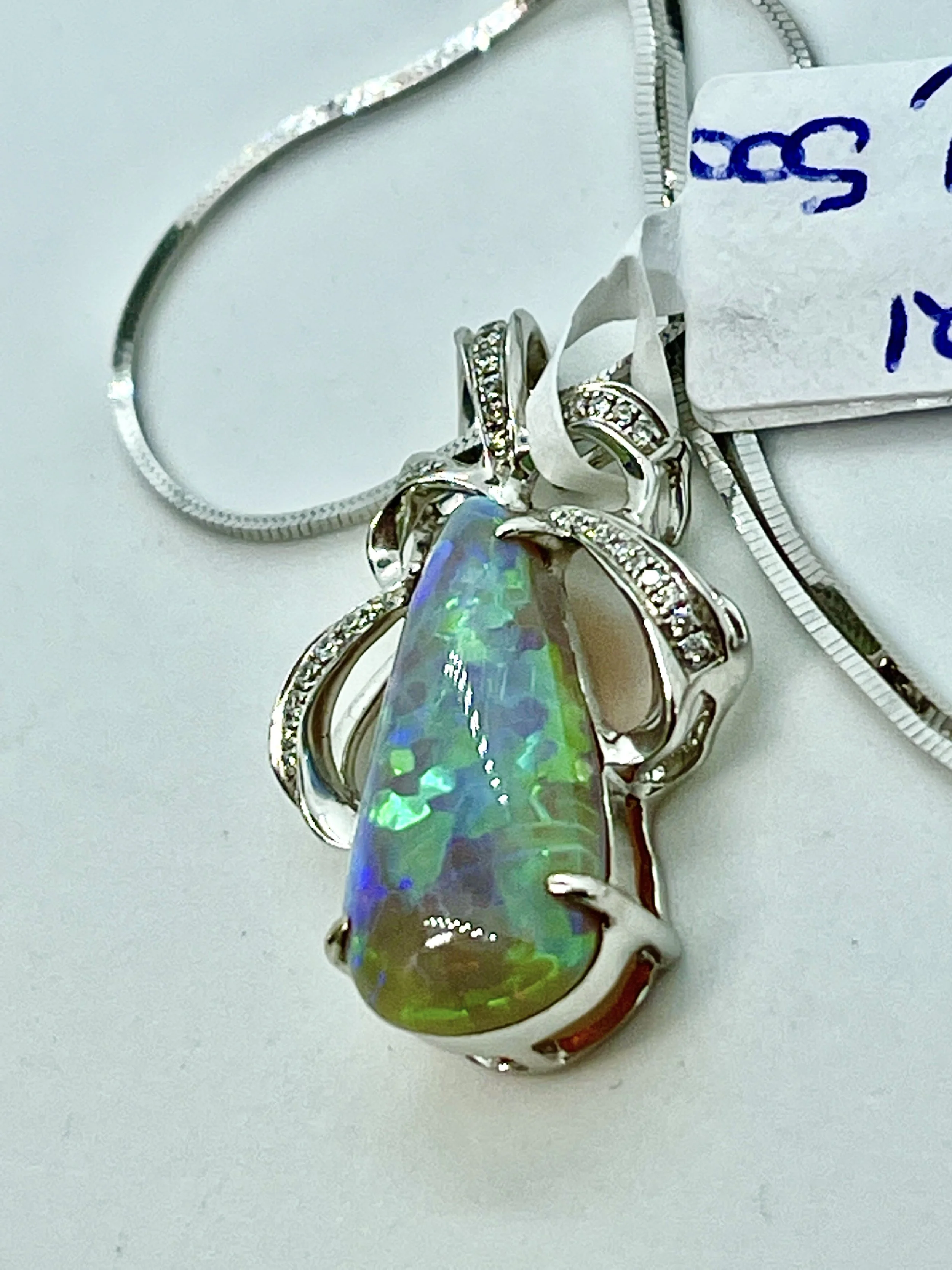 AMAZING SEMI TRANSPARENT SOLID BLACK OPAL PENDANT WITH DIAMONDS AND VALUATION
