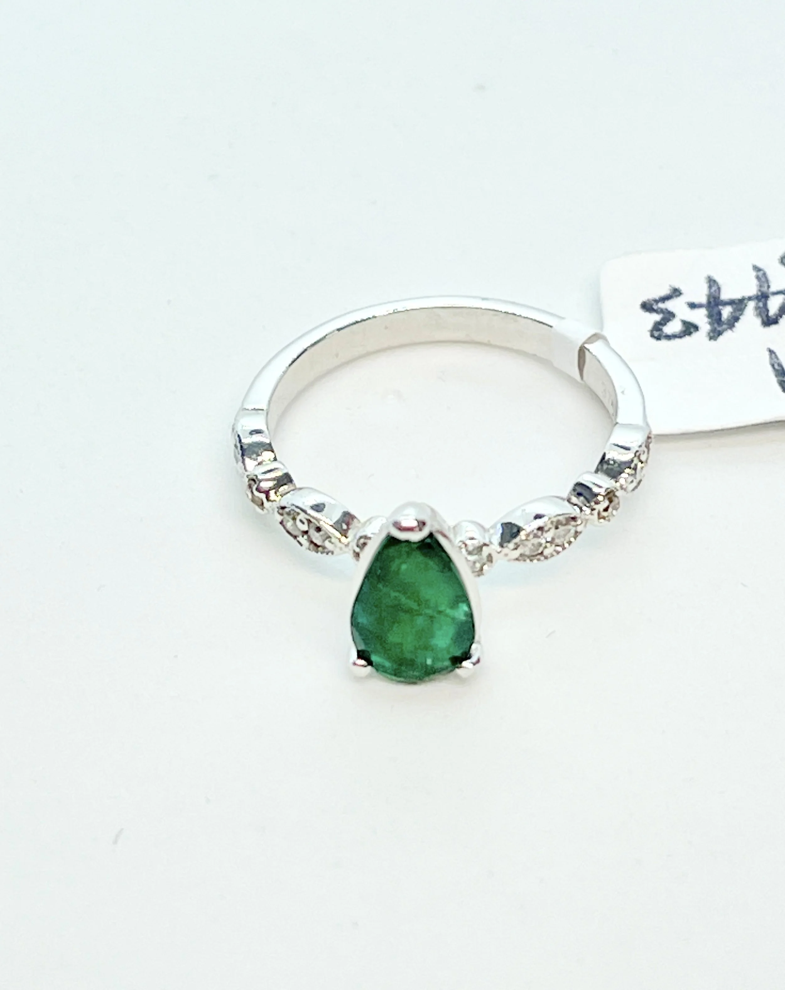 NATURAL PEAR SHAPED EMERALD AND DIAMOND RING WITH VALUATION