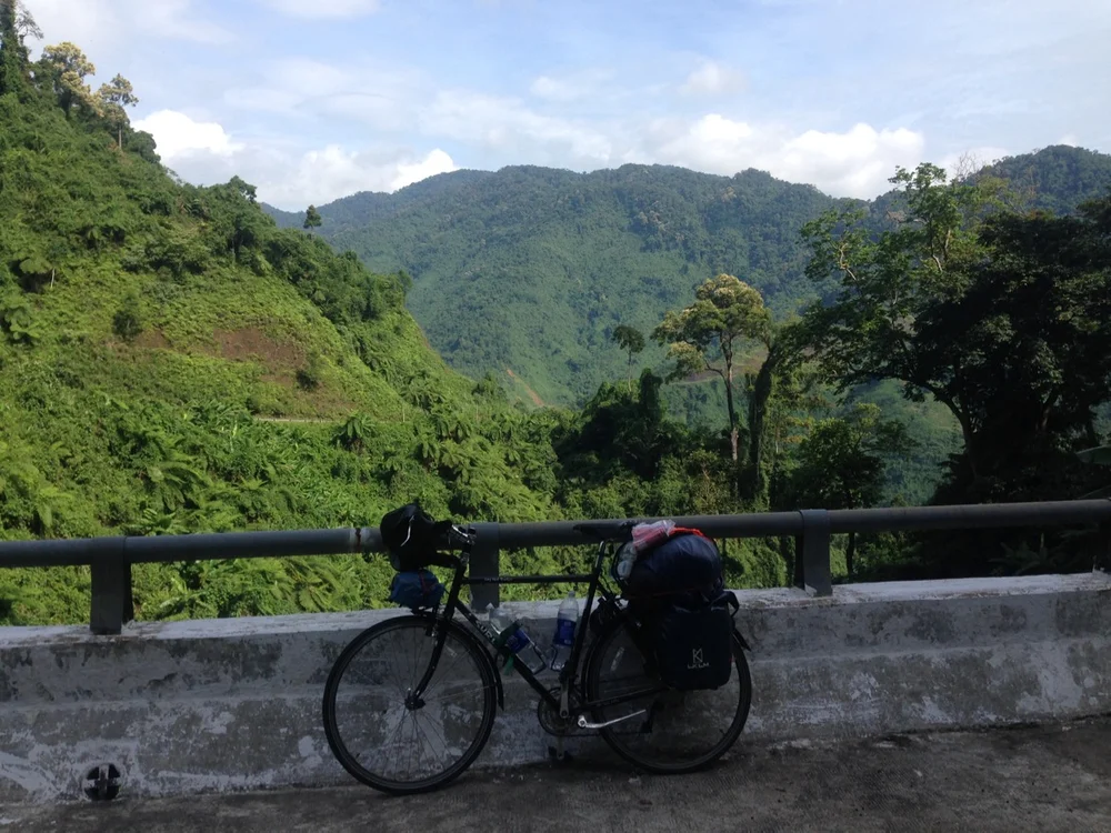  After the first climb, I saw this road going all the way down, and then going up through the mountains.  