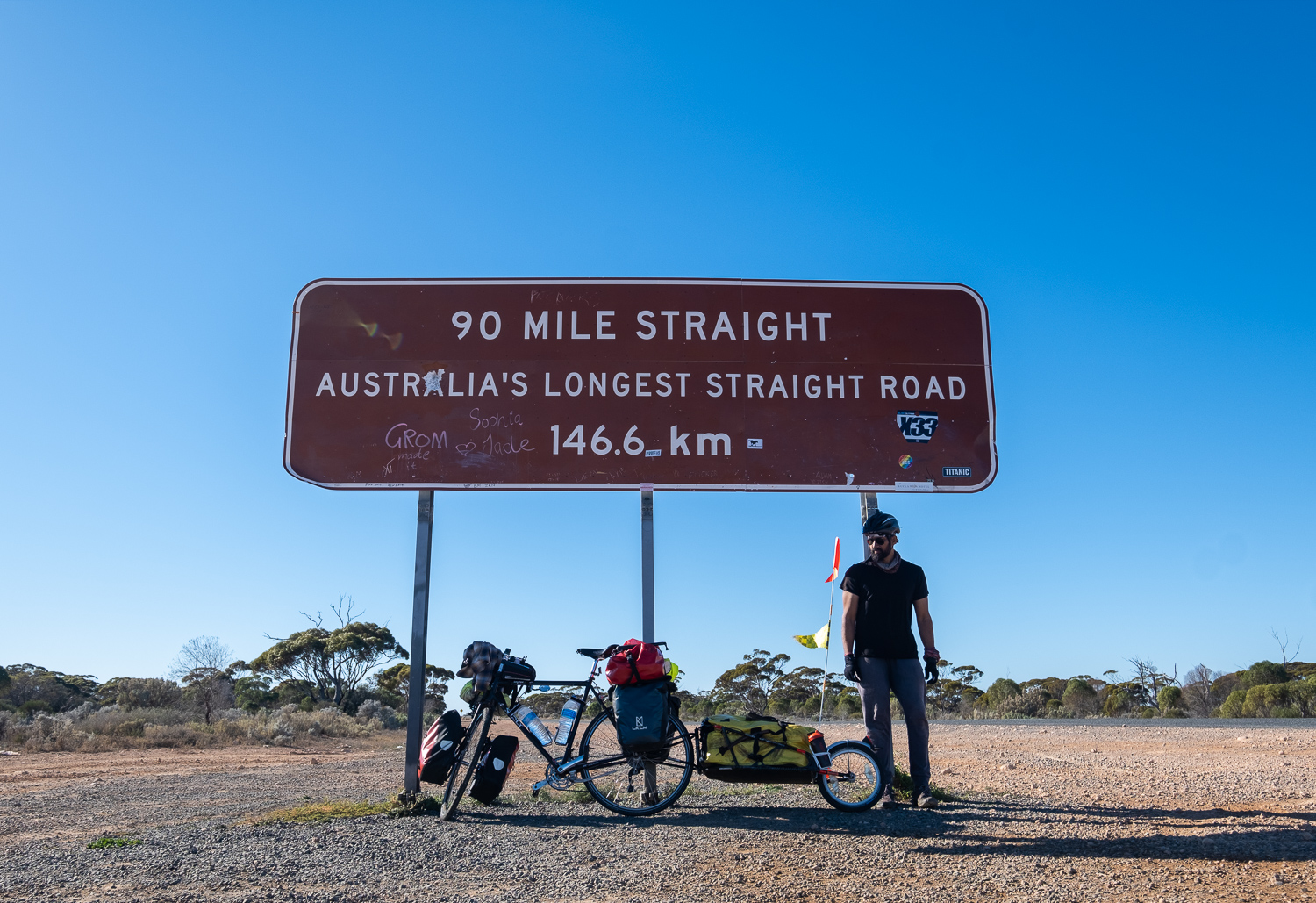  A popular photo spot.     The section between Balladonia and Caiguna  includes what is regarded as the longest straight stretch of road in Australia and one of the longest in the world. The road stretches for 146.6 kilometres (91.1 mi) without turni