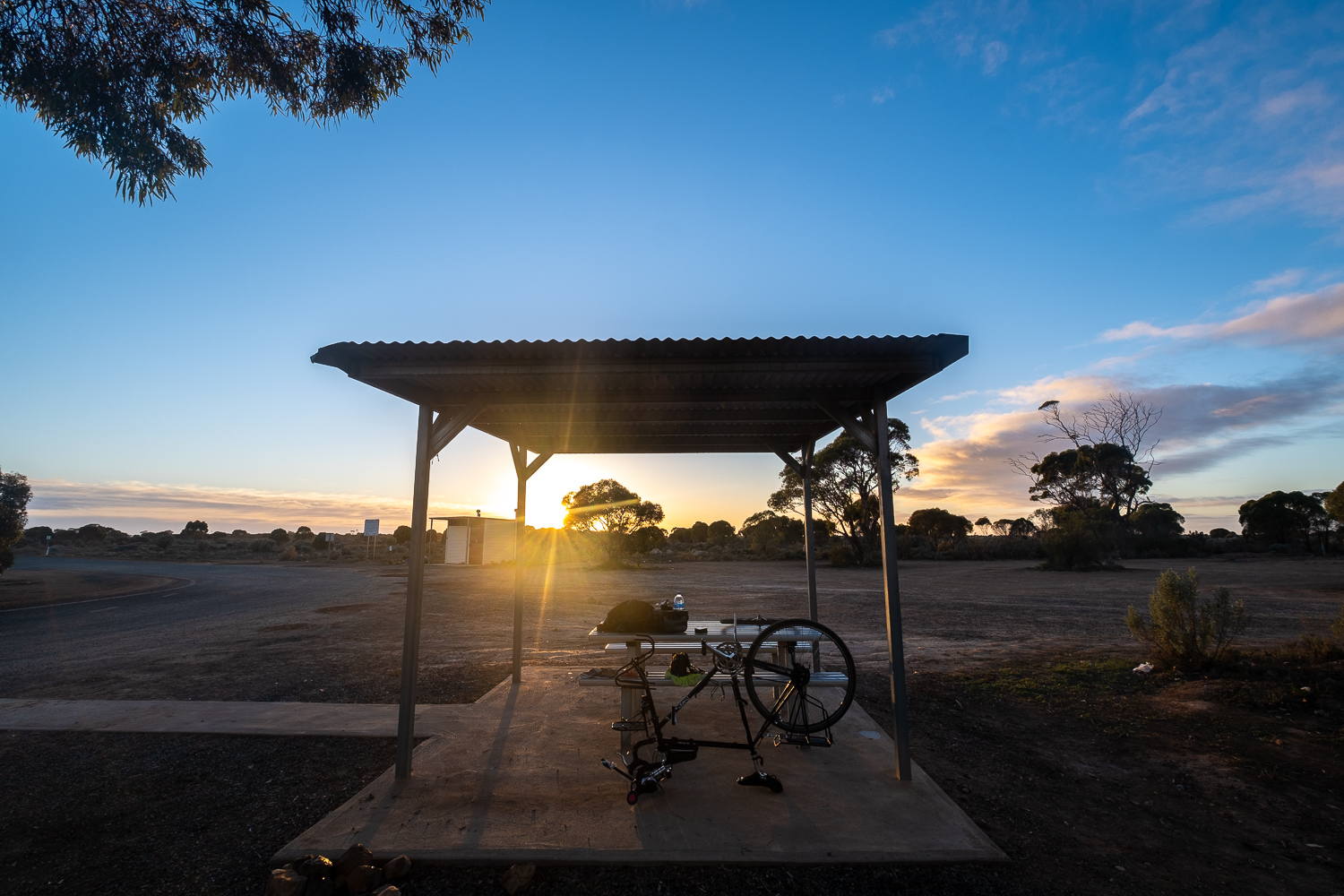  Fixing flat tires early in the morning. I usually wake up at 4am and pack up within an hour, and hit the road as soon as the sun comes up. 