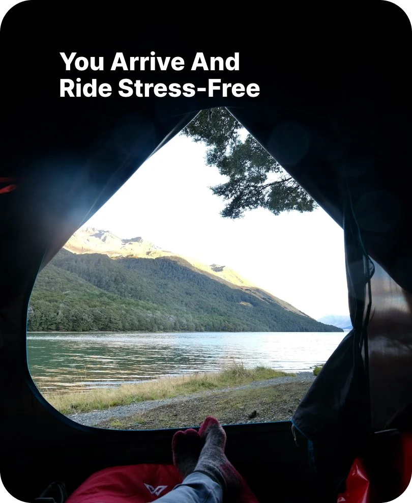 Cyclist riding through the scenic landscapes of New Zealand's South Island