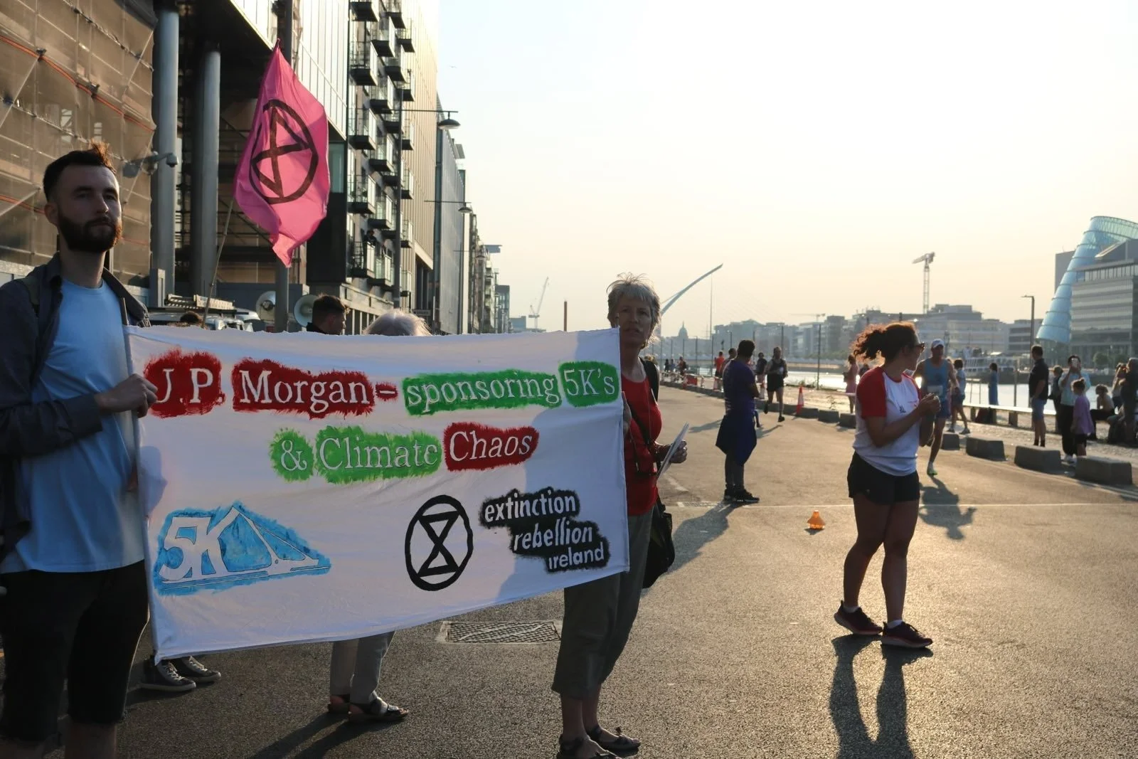 Extinction Rebellion calls out J.P. Morgan’s sponsoring of Docklands 5K as an exercise in image-laundering