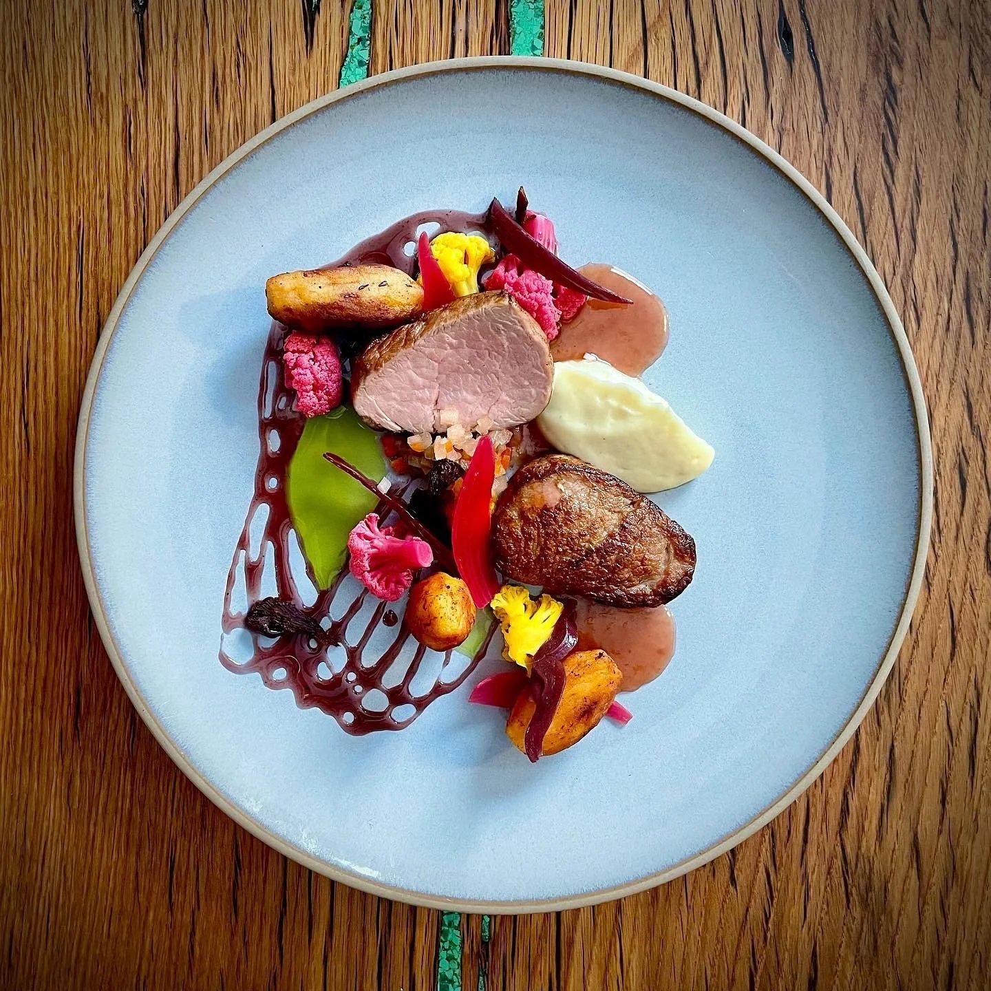 Pork tenderloin, parsnip mousseline, fermented blackberry