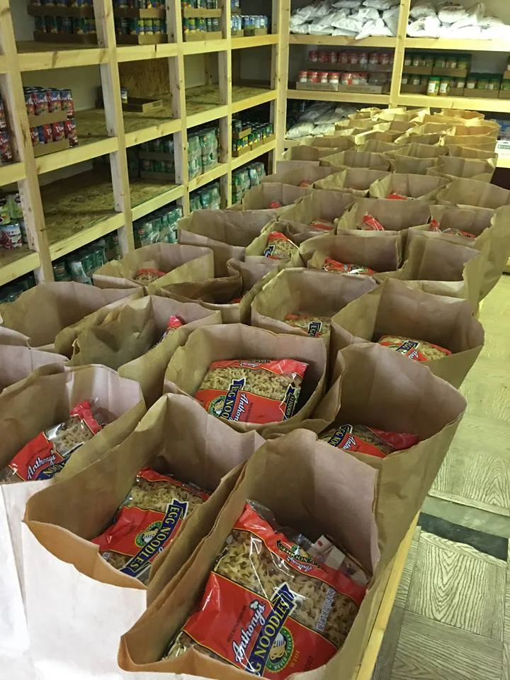 OUR FOOD BANK GIVES OUT AN AVERAGE OF 140+ BAGS OF GROCERIES PER MONTH