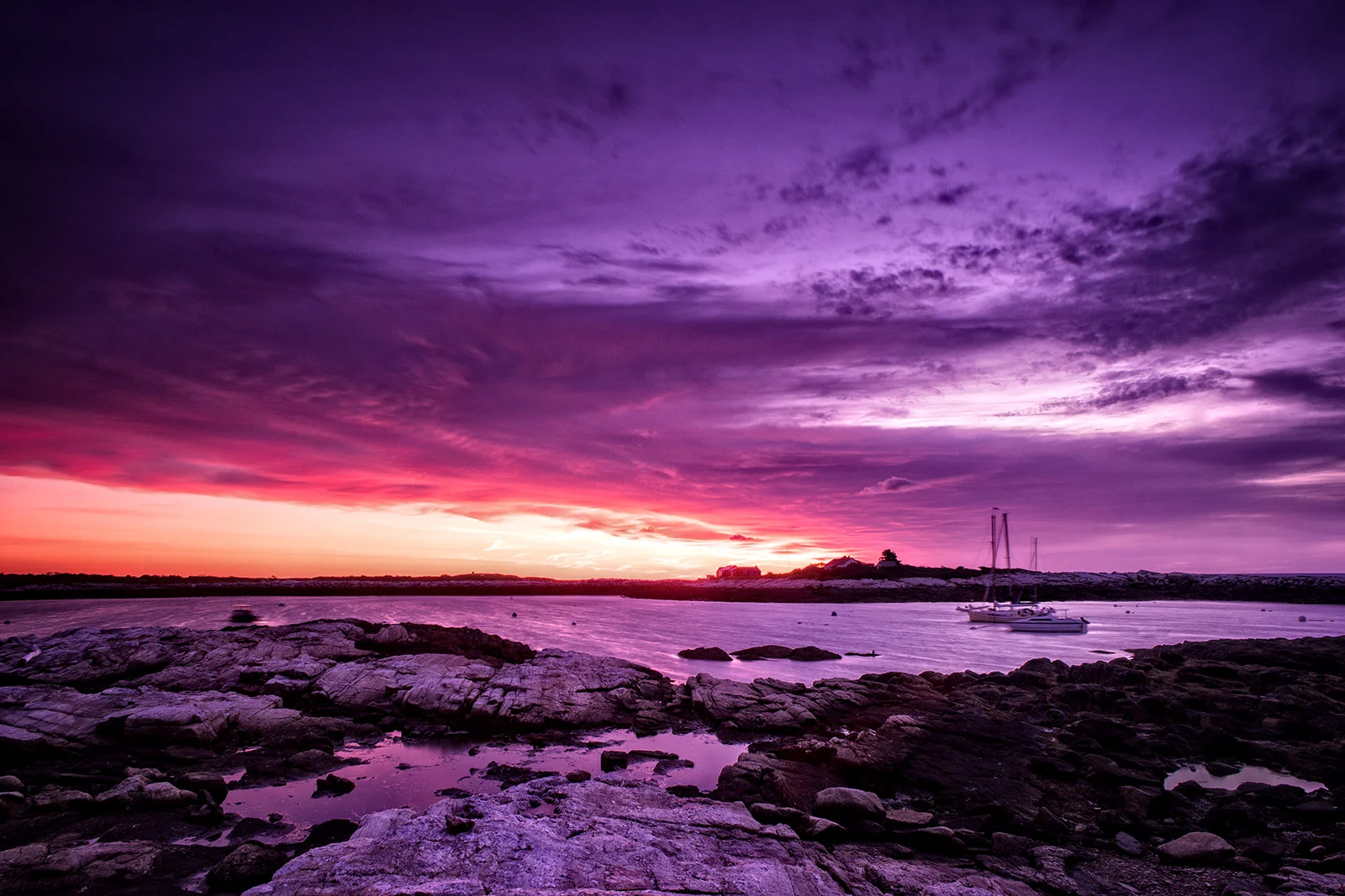 Sunrise on Star Island, New Hampshire. Photographed September 2018. This is a view of Gosport Harbor just as the sun was rising. Copyright by Guy D. Biechele