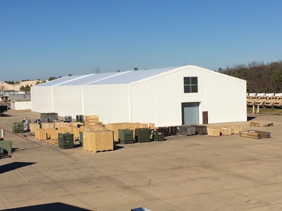  When the Defense Logistics Agency needed help, Shelter Structures responded with two fabric warehouses. One warehouse is 70’ by 225’, and the other is 70’ by 125’. Both warehouses include 12’ by 12’ overhead doors, two personnel doors, ventilation s