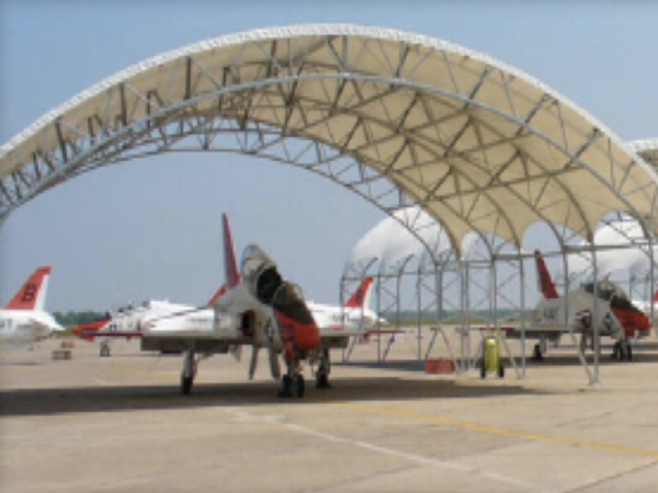  The Naval Air Stations at Kingsville, TX and Meridian, Ms each ordered 16 aircraft hangars to protect their T-45 Goshawk trainers. The hangars will lower the cockpit temperatures by 80 degrees in the summer, and are built to withstand winds of 130 m