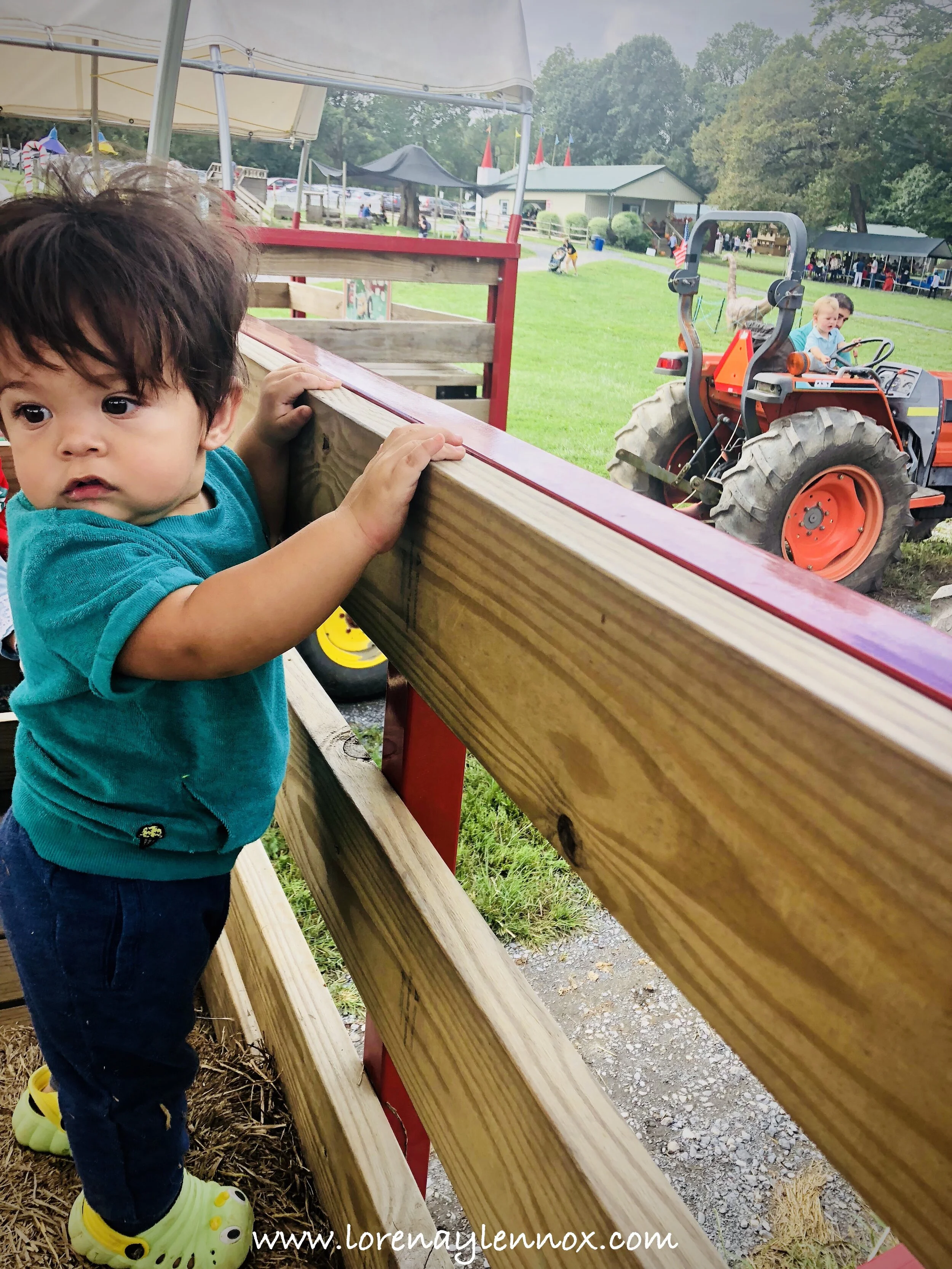 Toddlertober Bucket List: 31 Easy Peasy Fall Activities for Your Toddler To Do This October - Go On A Hay Ride