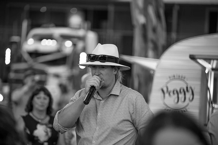 The MC on the mic - photo by Shayne Mostyn Photography