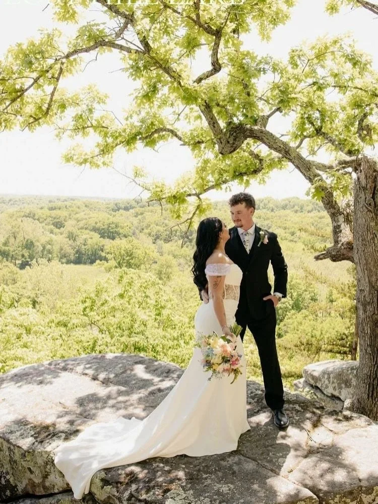 🌸✨ Spring weddings hit different out here &mdash; sunshine, blooms, and vibes so good the guests feel a glow-up.

▪️Soft light dancing through the ever-budding canopy
▪️Fresh blooms adding even more to the natural Ozark 
  scenery
▪️Full-day timelin