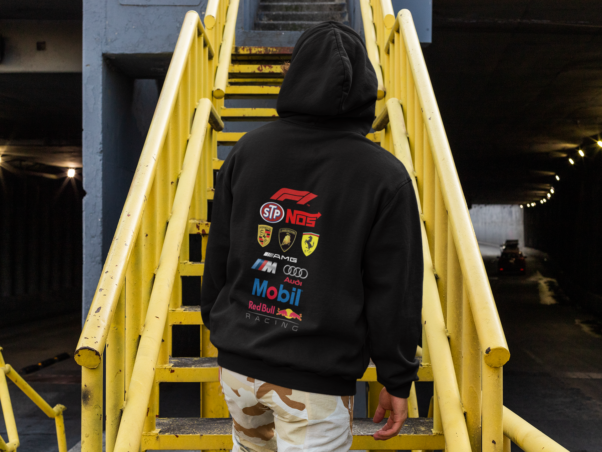 back-view-mockup-featuring-a-man-wearing-a-hoodie-and-on-a-metal-staircase-m526.png