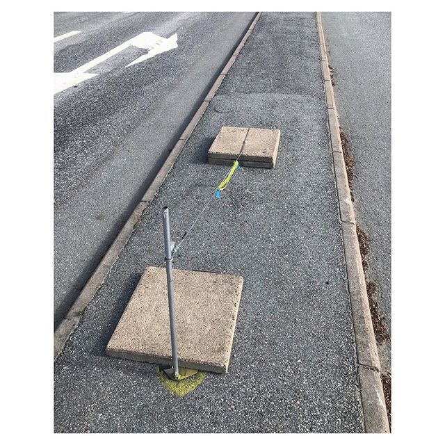 New unsanctioned public art by Antony+Bergh(A+B)&nbsp;. Bricks of concrete, spray&nbsp;paint, lead wire, iron poles&nbsp;in pavement, plastic ribbons). This public installation was placed&nbsp;in front of the Hallstavik Library as a part of the ongoi