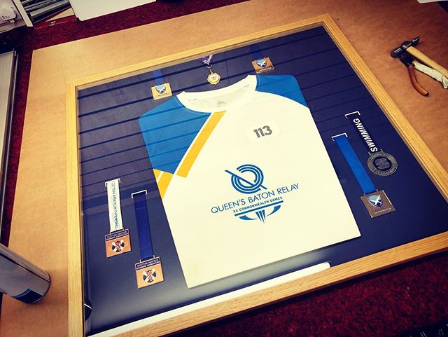 Jersey and medal combination #framingart #framing #framed #jerseyframing #framer #glasgowframing #medalframing #queensbatonrelay #commonwealthgames #scottishswimming