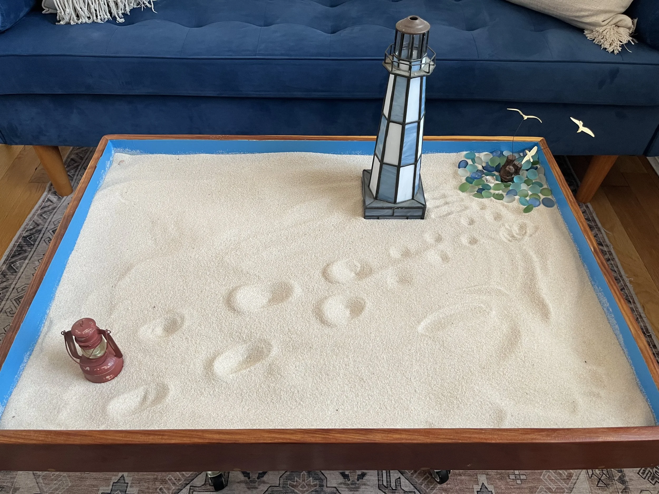 sand tray with an ocean shore scene