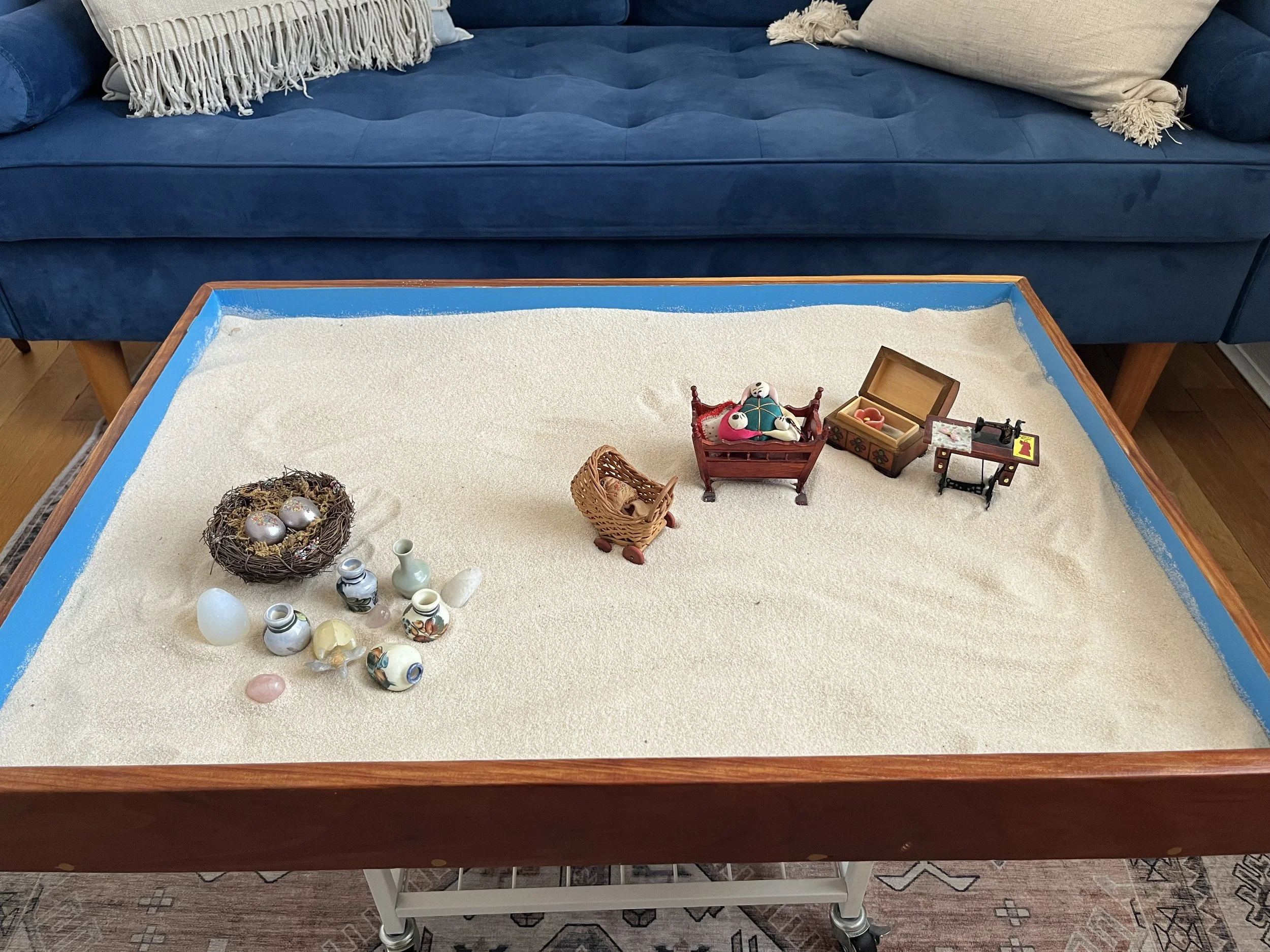 sand tray with a nest scene