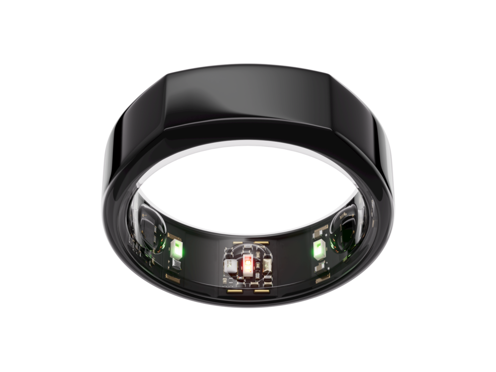 Oura ring. Black and shiny, with electronic parts visible inside the ring.