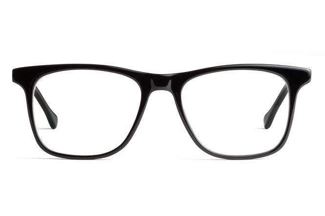 Felix Gray Blue Light Blocking Glasses. Black plastic frames in a thin wayfarer shape with clear lenses.